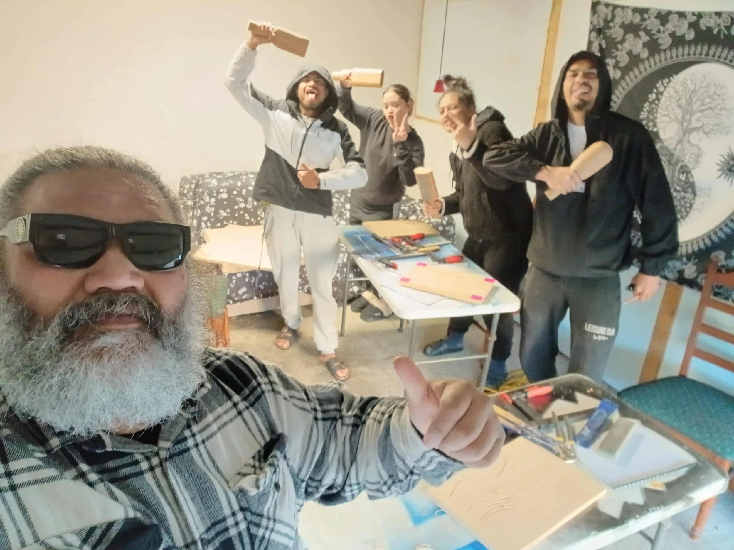 Carving group with patu.jpeg