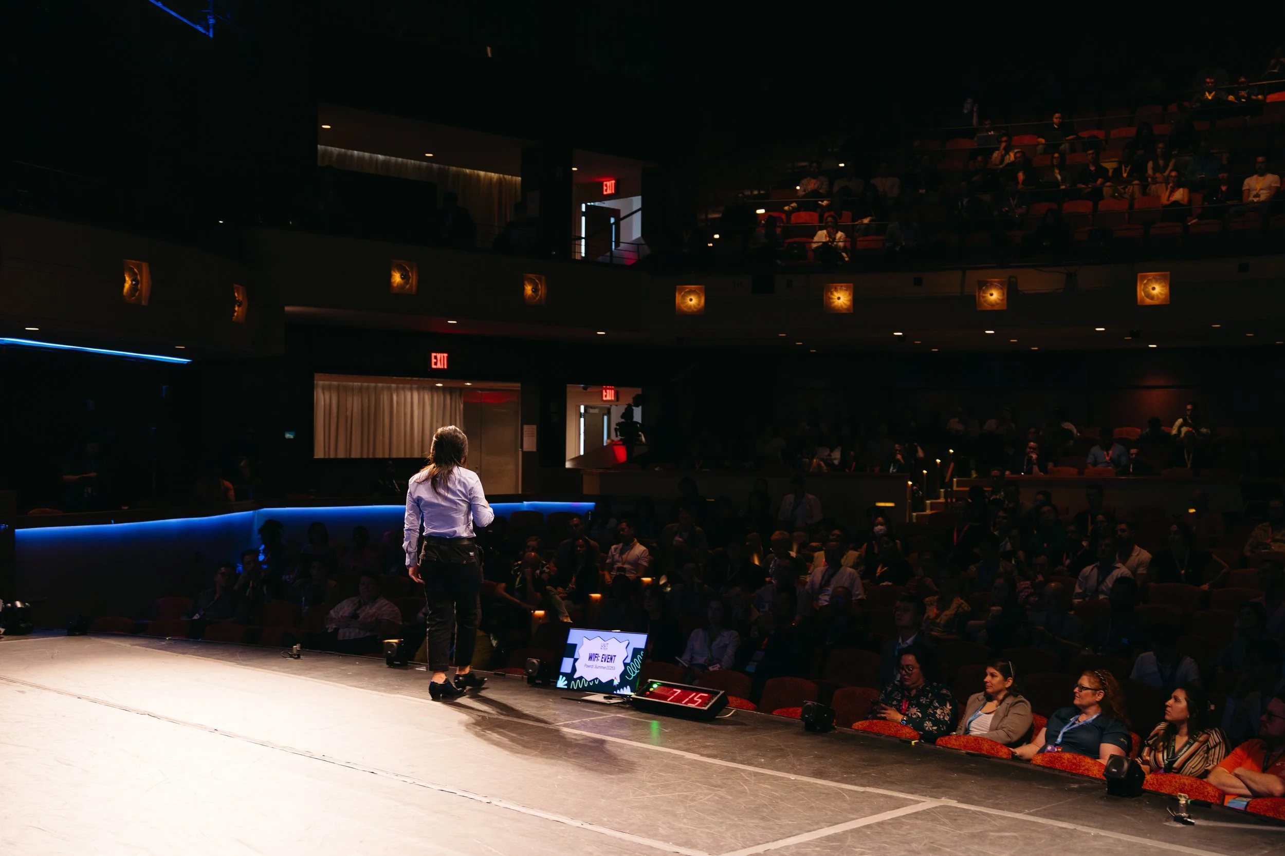 Woman speaking at a live event