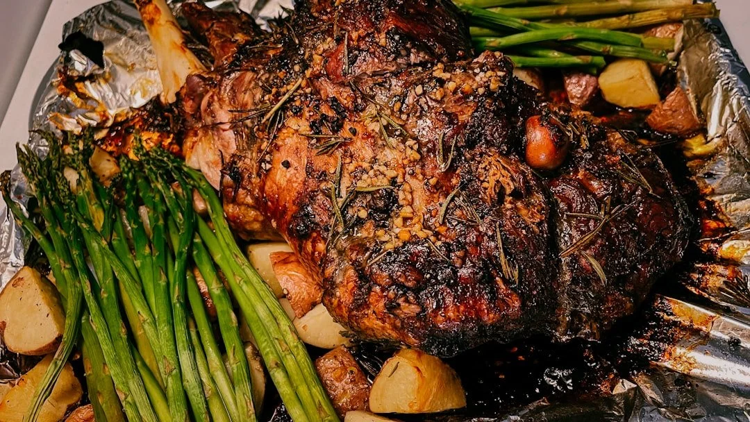 Slow-Cooked Roast Lamb with Rosemary, Garlic, Potatoes & Asparagus