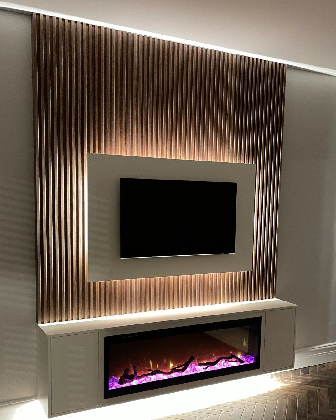 Some evenings call for something softer, while others favour a cleaner, more minimal setting. The first media wall centres around the fireplace and soft lighting, creating a comfortable place to sit as the day winds down. The other adopts a more mini