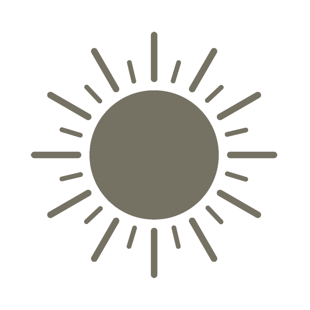 A graphic illustration of the sun with a solid circle in the center and lines radiating outward.