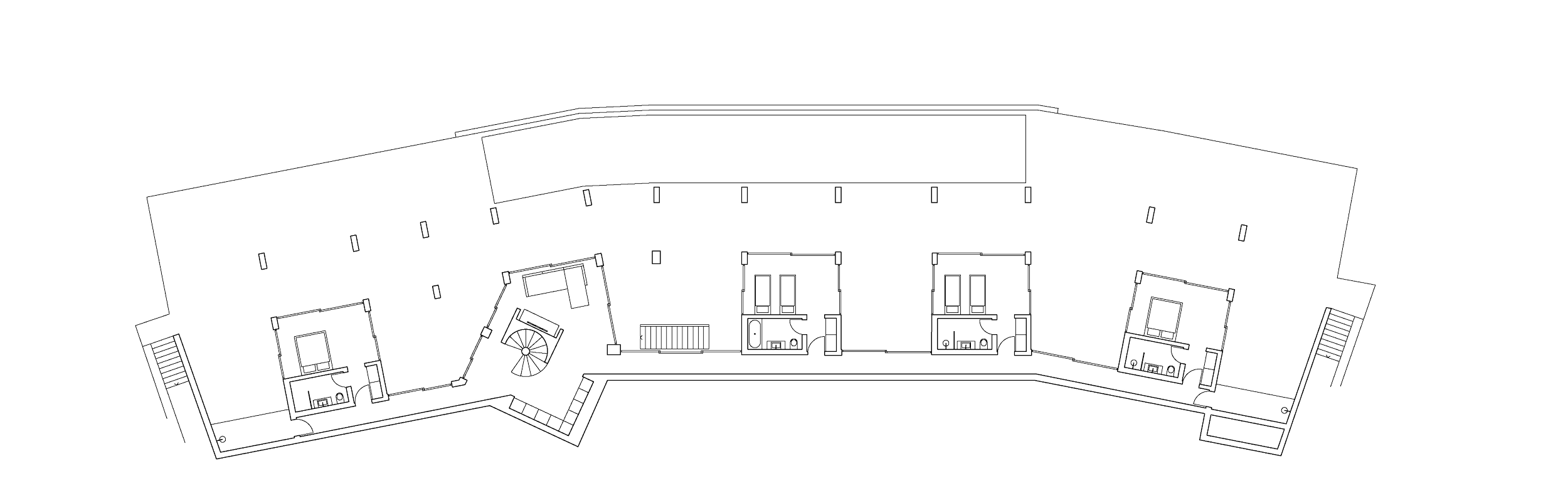Grundriss eines mehrstöckigen Gebäudes mit mehreren Zimmern, Treppen und Fluren.