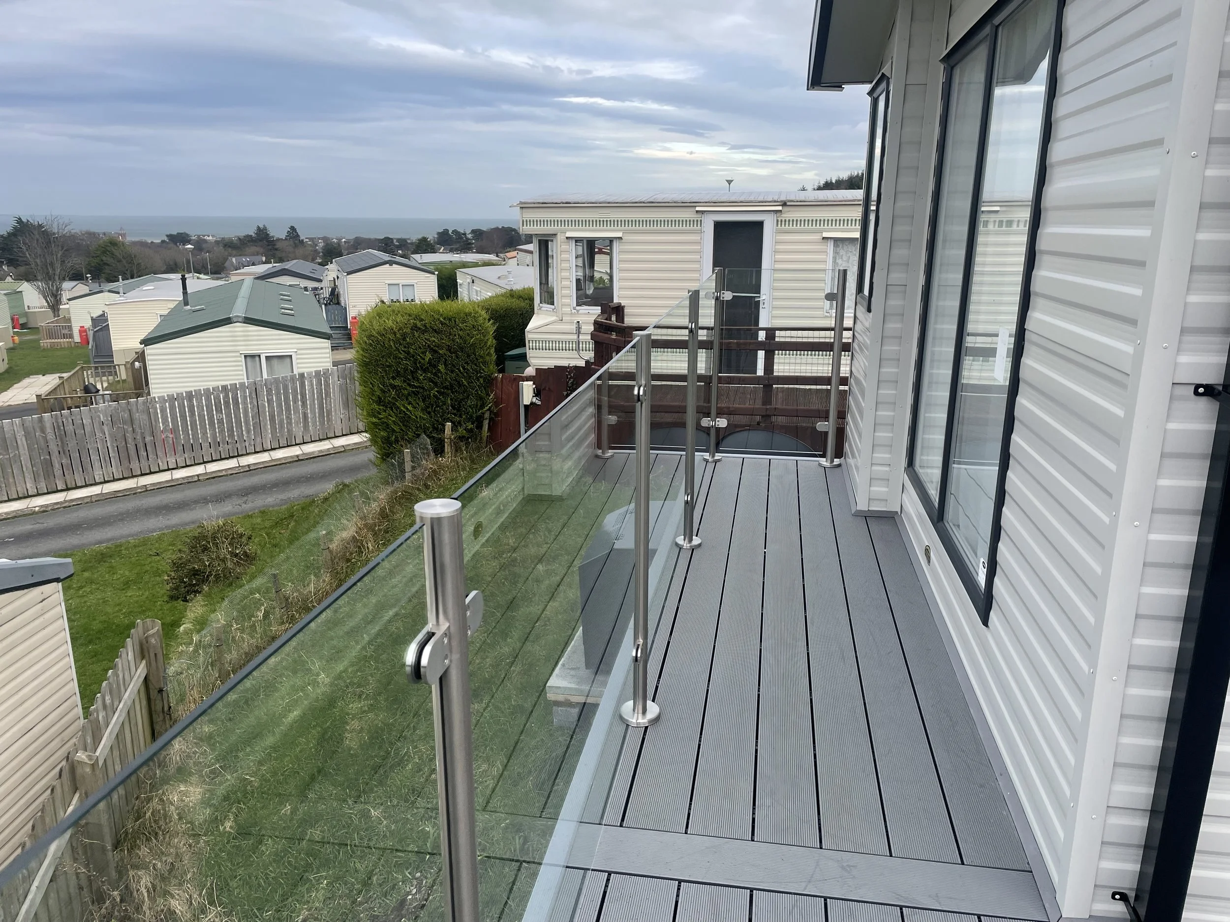 Can Glass Balustrades add safety and security to my outside area?