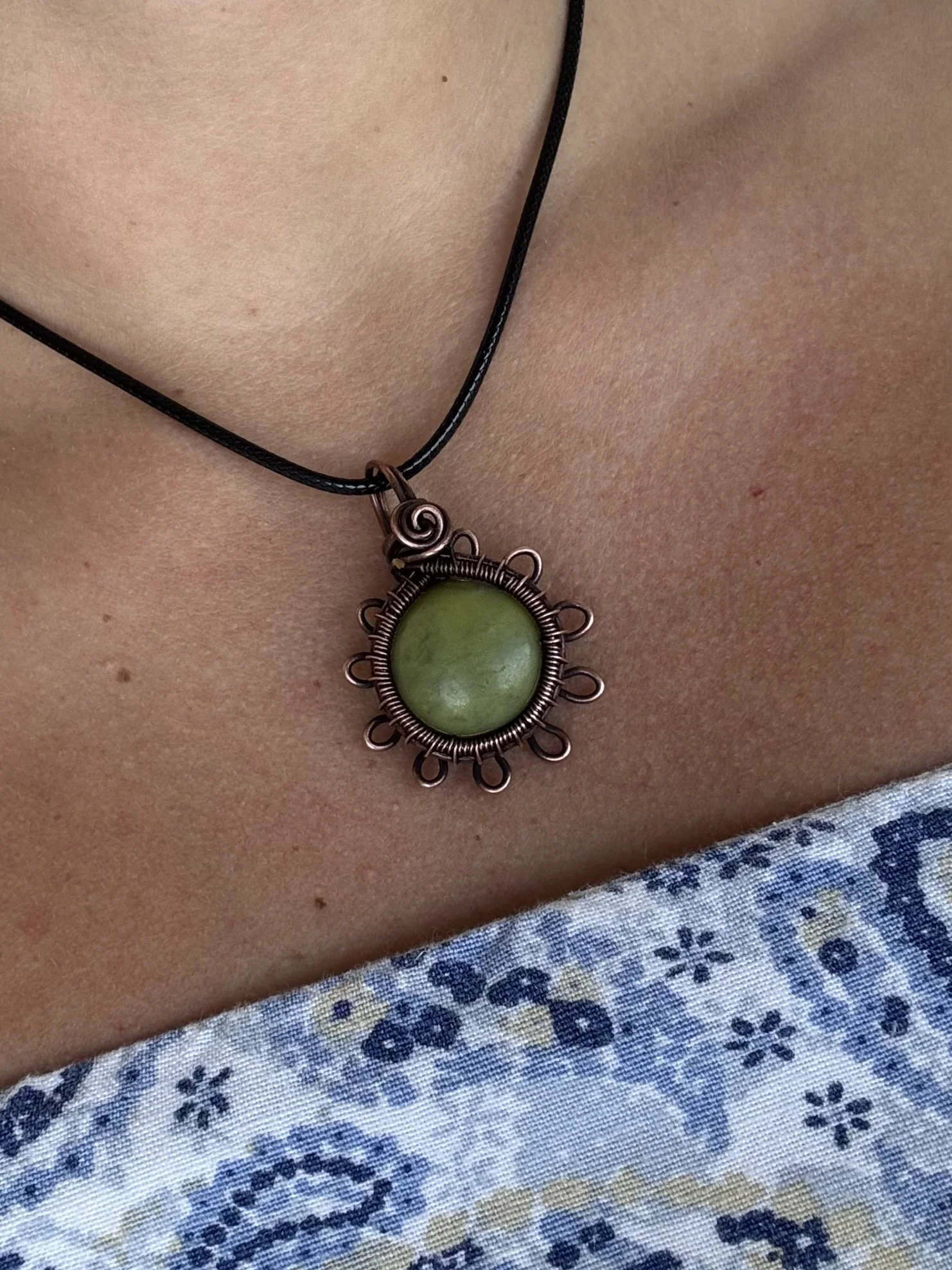 Serpentine Flower Pendant wrapped in raw Copper