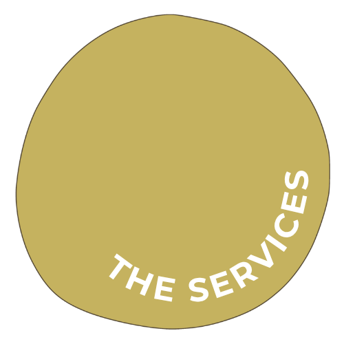 Gold circular emblem with white text that says 'THE SERVICES'.