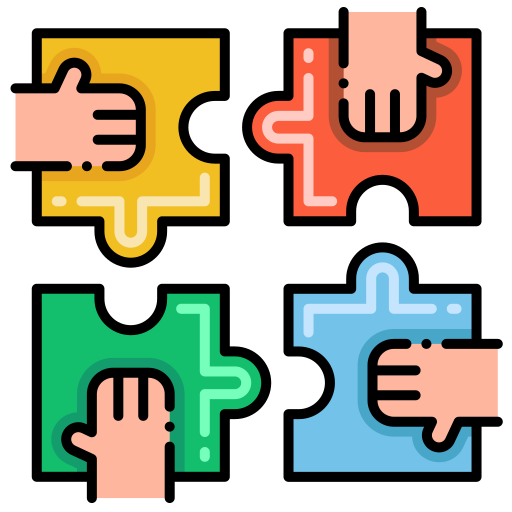 Four puzzle pieces with hands grasping each piece, representing teamwork. The pieces are yellow, red, green, and blue.