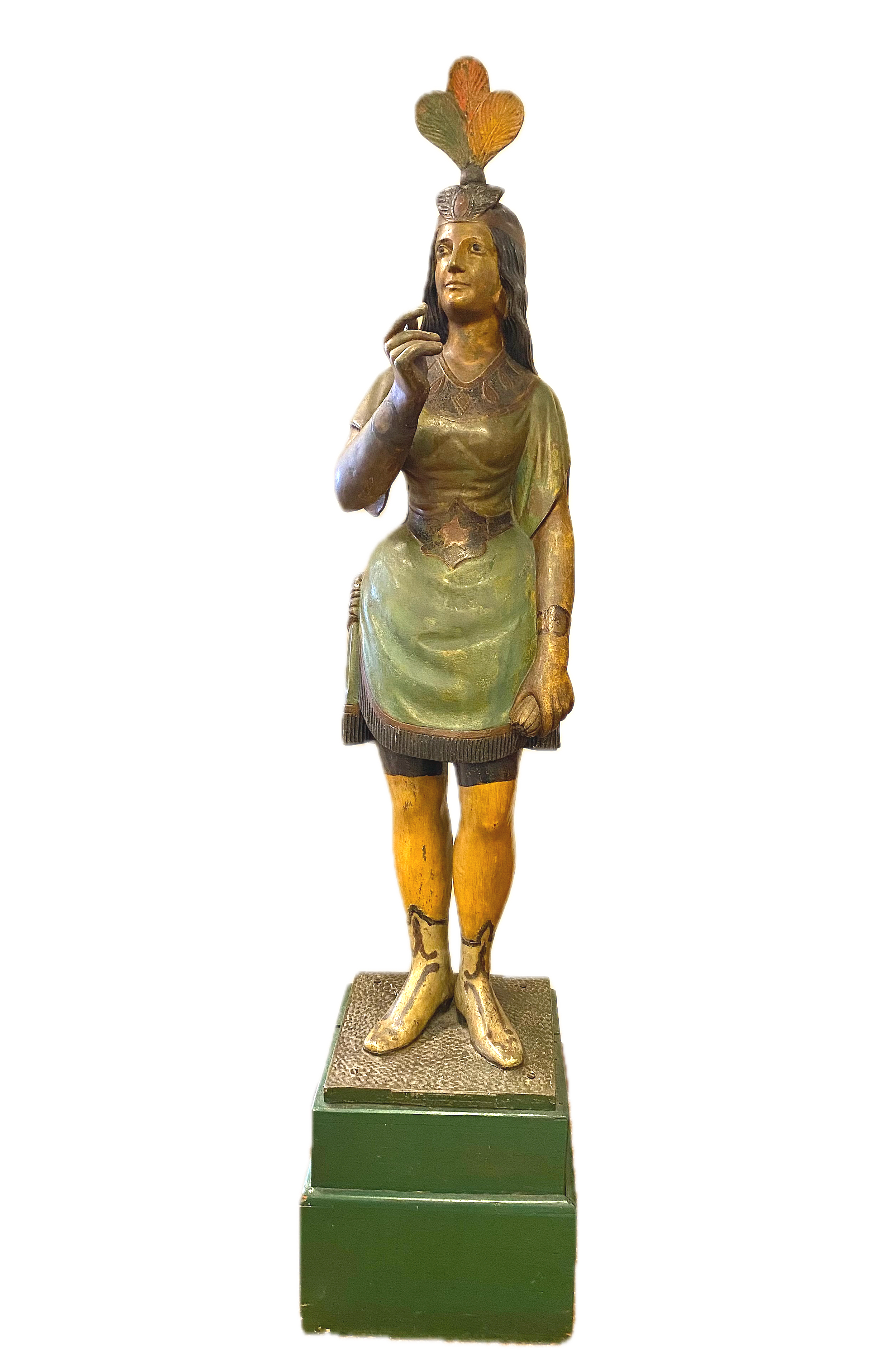 A fine painted metal Cigarstore Indian Squaw, 
Made by William Demuth & Company, NY,  c. 1880; Labeled by maker at base.
The figure wears a green dress with black fringe, yellow leggings and shoes,
On a metal base further set on a green painted stepp