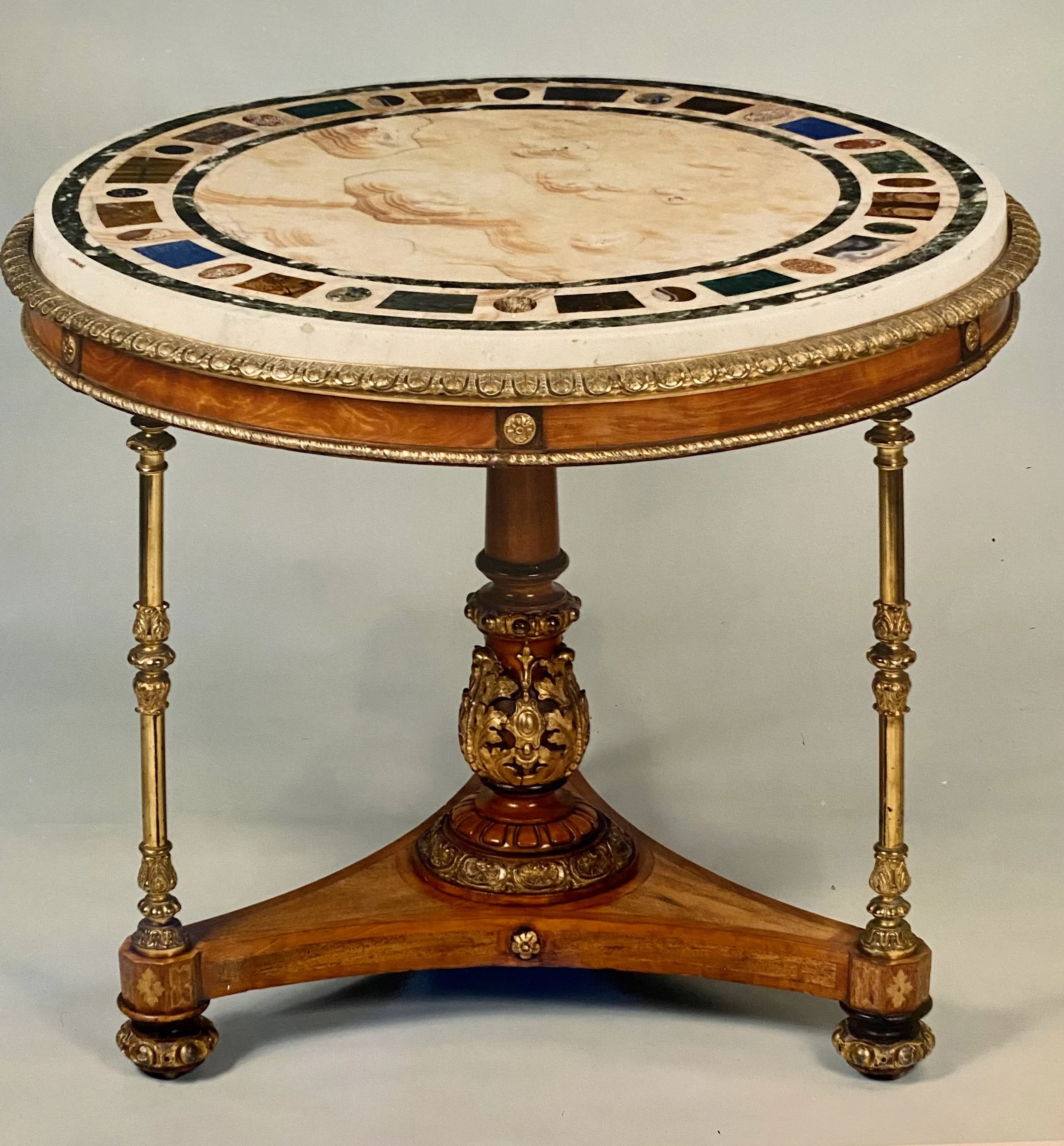 Early 19th Century Satinwood and Ormolu Mounted Gueridon; with Onyx Top and Inlaid with Various Semi Precious Stones and Marbles (39 inches diameter x 30 ½ inches high). Provenance: Philip Hewart-Jaboor Works of Art, London, 1987