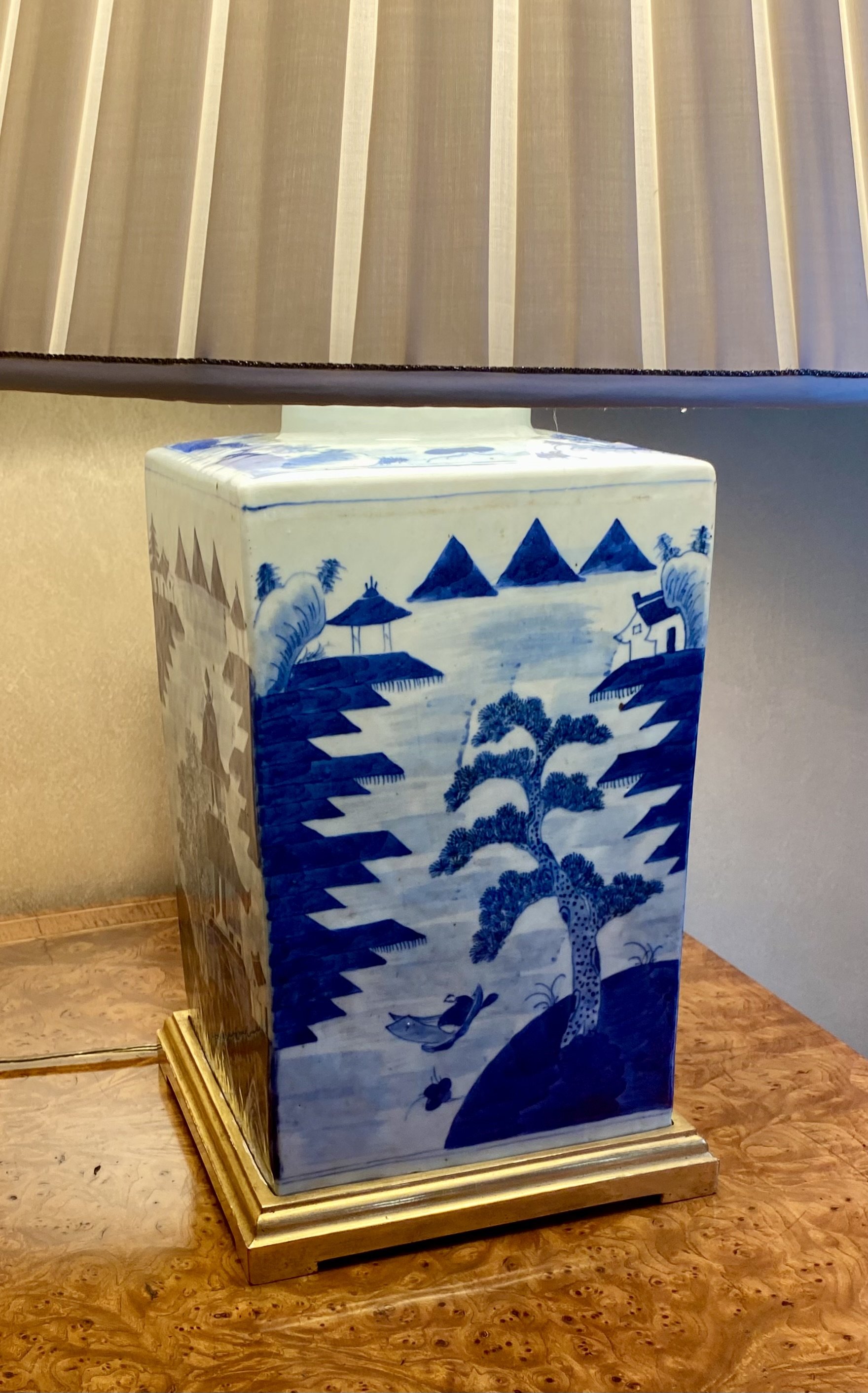 Pair of Fine Canton Porcelain Square Blue and White Lidded Containers, c. 1840;
Newly wired as lamps, with custom shades
(26 inches adjustable finial height)
Provenance: Hyde Park Antiques, New York, c. 1840, 11/20/08