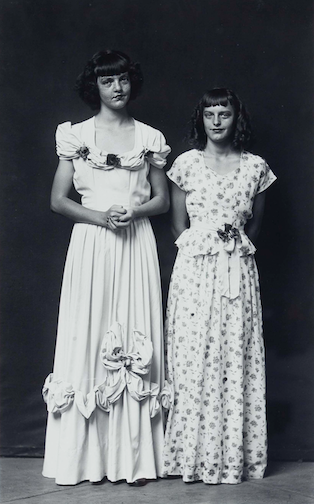 Mike Disfarmer (1884-1959)  Iona and Picola Parker, Herber Springs, Arkansas, 15/75, c. 1940 – 1945
Gelatin-silver photograph measuring 12 x 7 ½” on paper measuring 14 x 11”.
From a posthumous authorized edition by Disfarmer biographer Julia Scully, 