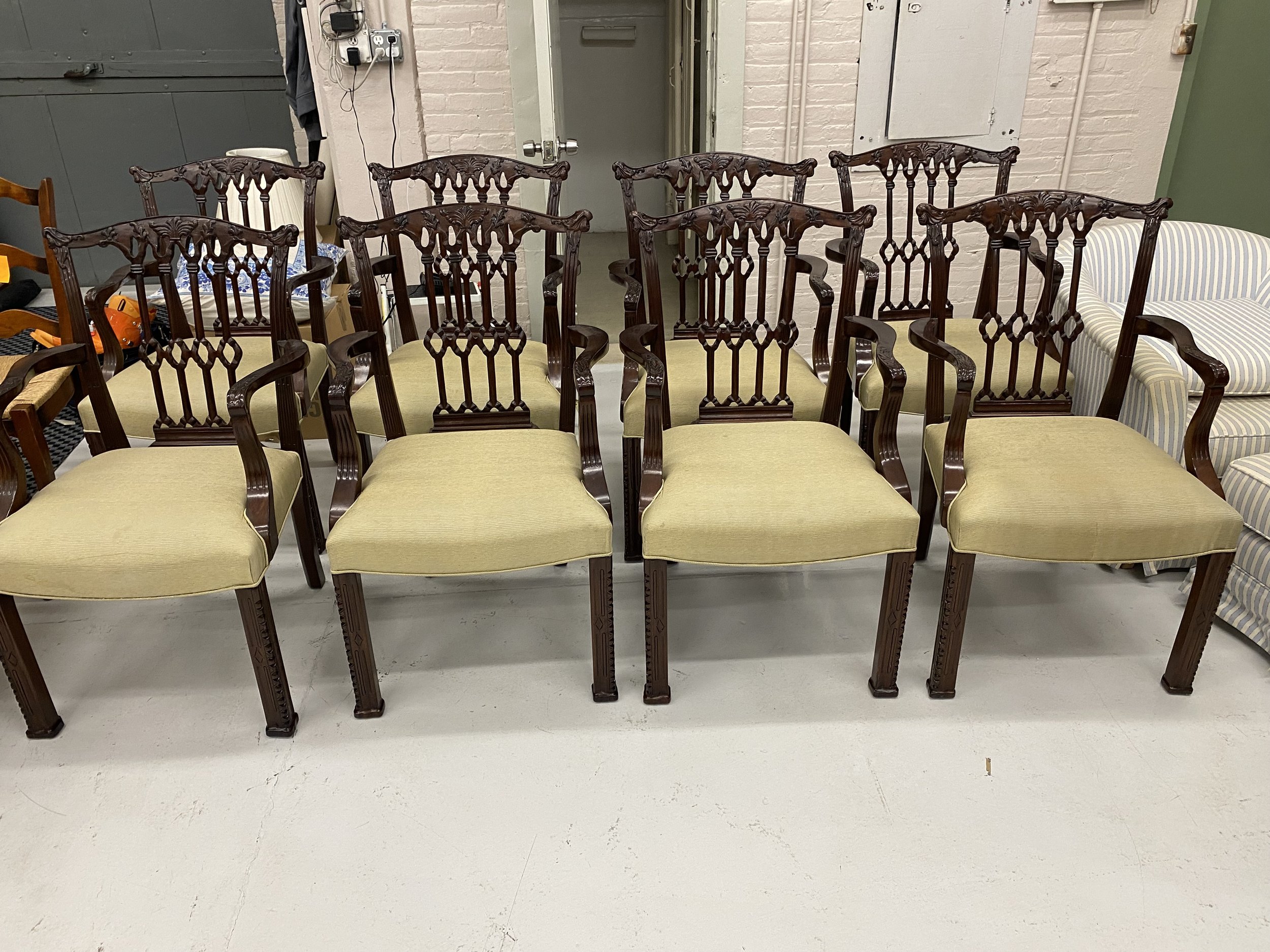 Set of Eight (8) Chippendale Style Mahogany Arm Chairs
Size: 24 inches wide x 21 inches deep x 39 ½ inches high
