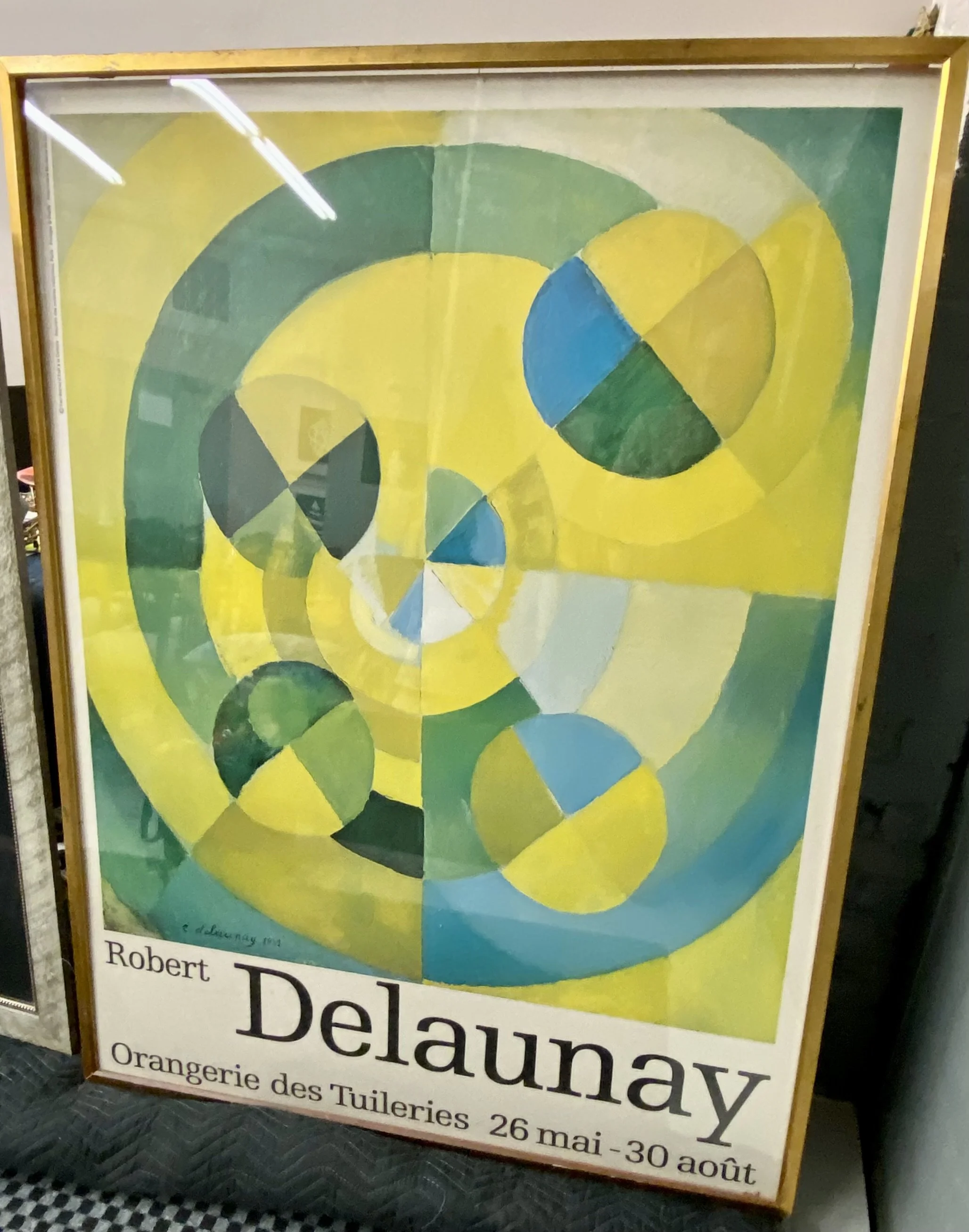 OVERSIZED Robert DELAUNAY Vintage Framed Poster (depicting yellow/green circular abstracts – from a Paris Tuileries exhibit in 1976 (condition issues to frame)
Size: 64 inches high x 49 inches wide 
