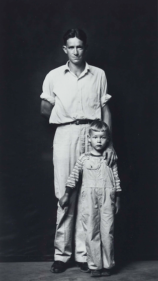 Mike Disfarmer (1884-1959) Crawford Dean and Son, Herber Springs, Arkansas, 35/75, c. 1940 – 1945
Gelatin-silver photograph measuring 10 x 5 ½” on paper measuring 14 x 11”.
From a posthumous authorized edition by Disfarmer biographer Julia Scully, 19