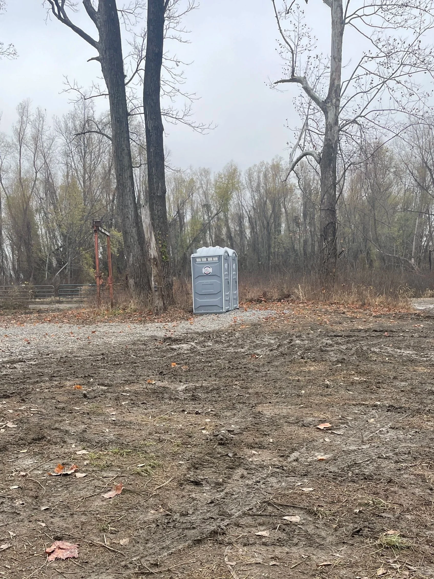Portapotties at a deer camp 