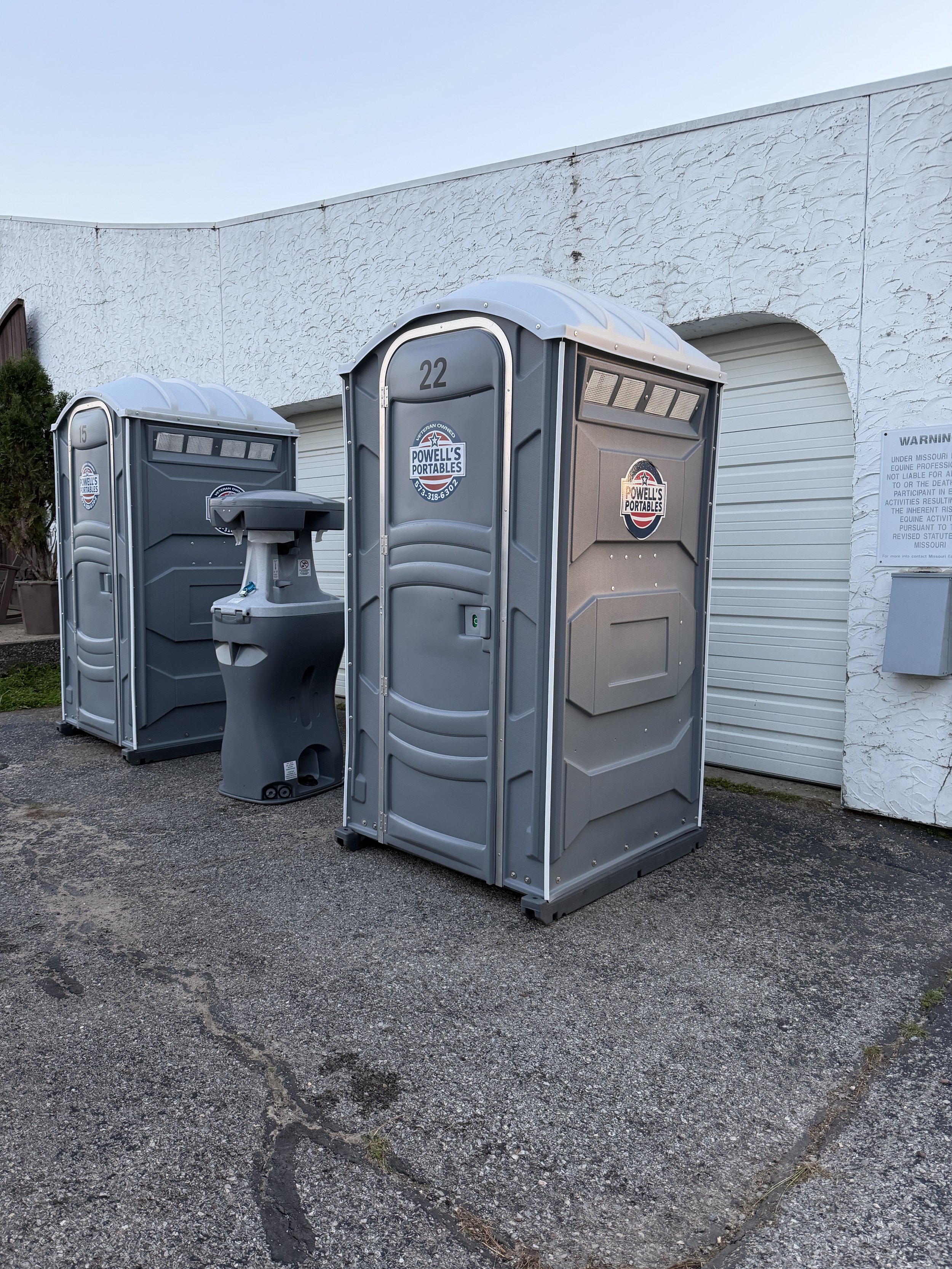 portapotties and handwash station at an event in Benton
