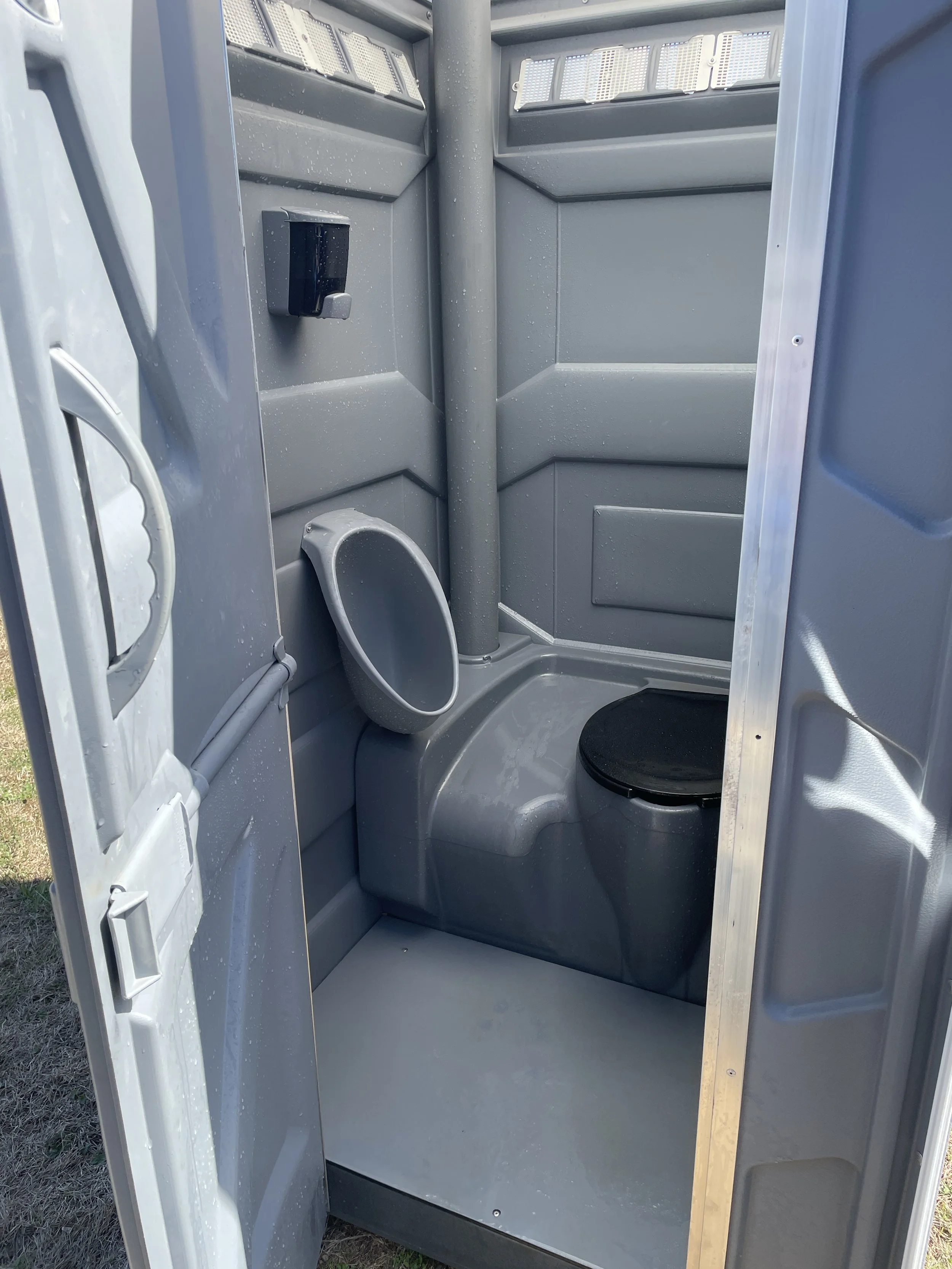 portapotty urinal and hand sanitizer