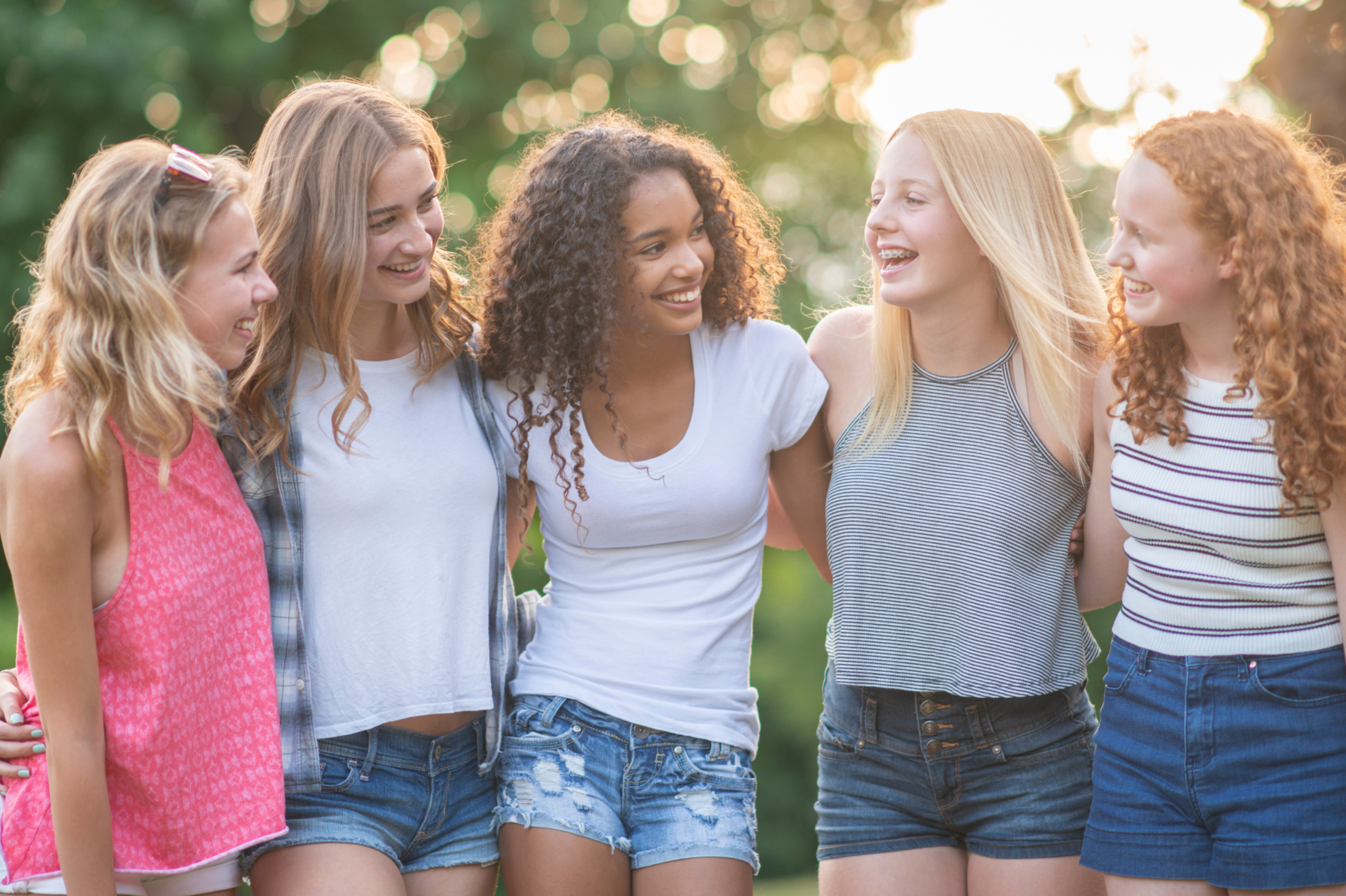 An image of teenage girls on the NRQi Studio Teen Period clinic page