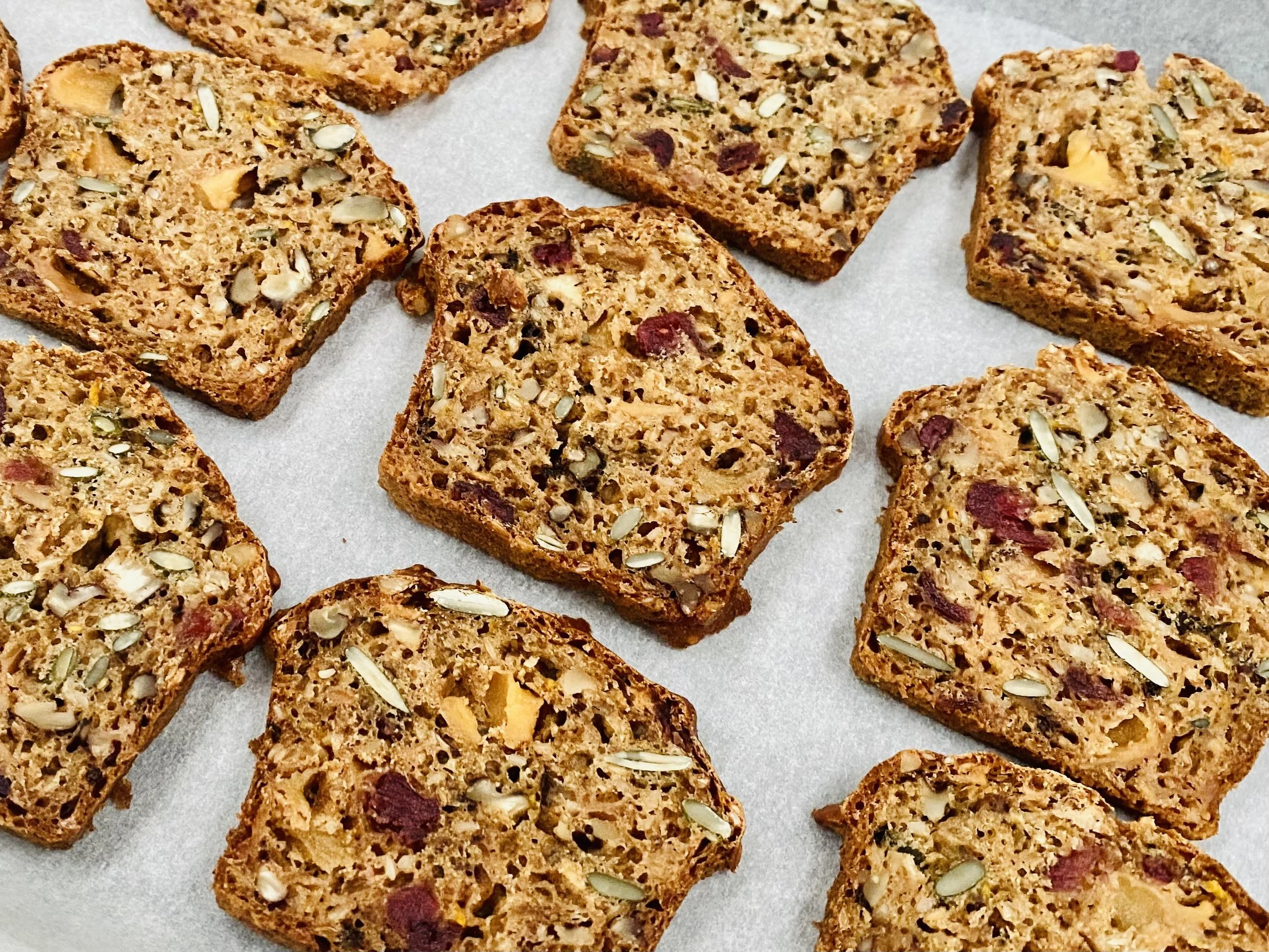 NRQi Studio's Christmas Spiced Crackers with Savoury Seeds recipe baked and ready to eat.