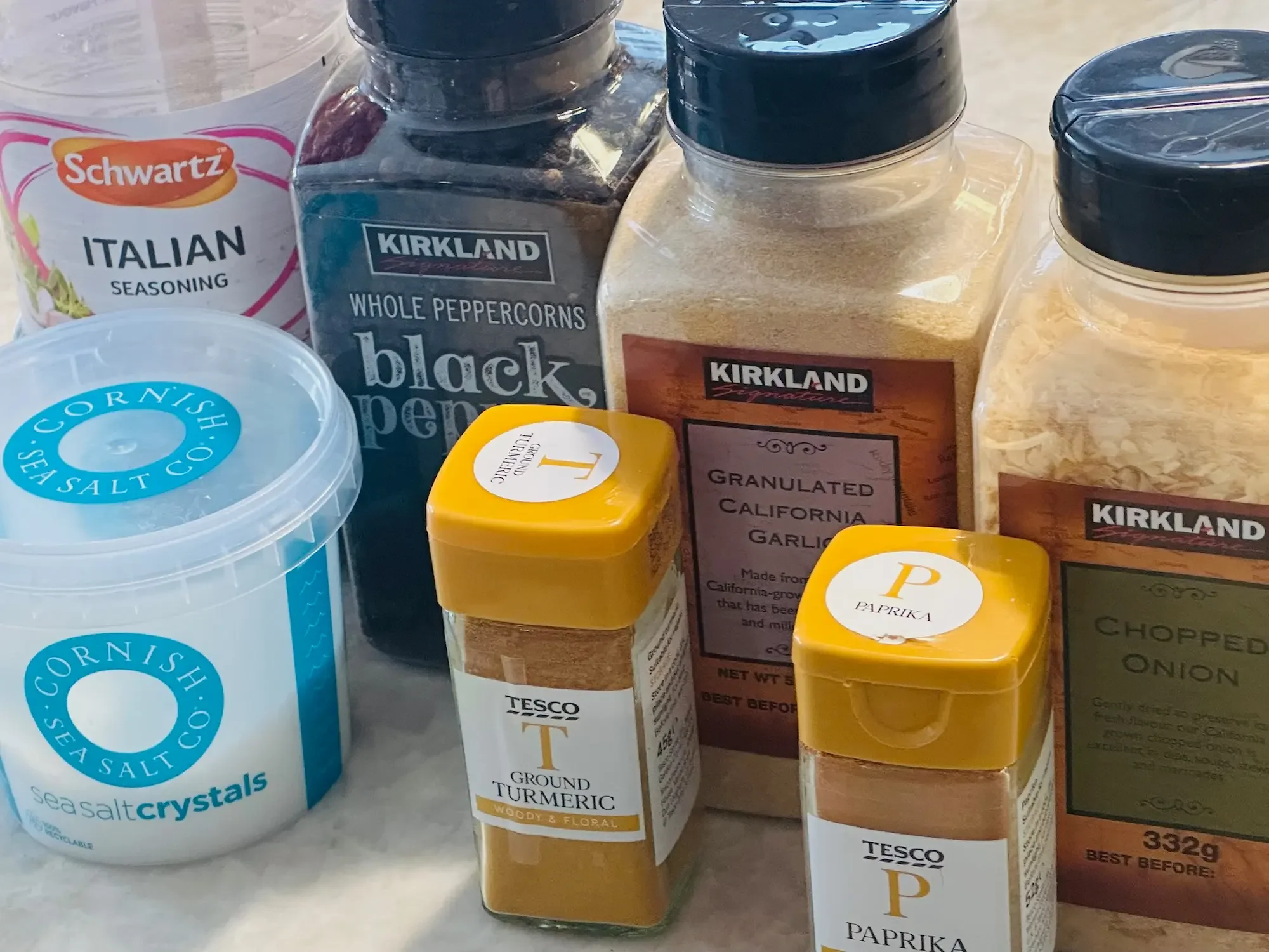 A variety of spices and seasonings to make NRQi Studio's recipe for bone broth to support with health and wellness from a TCM perspective.