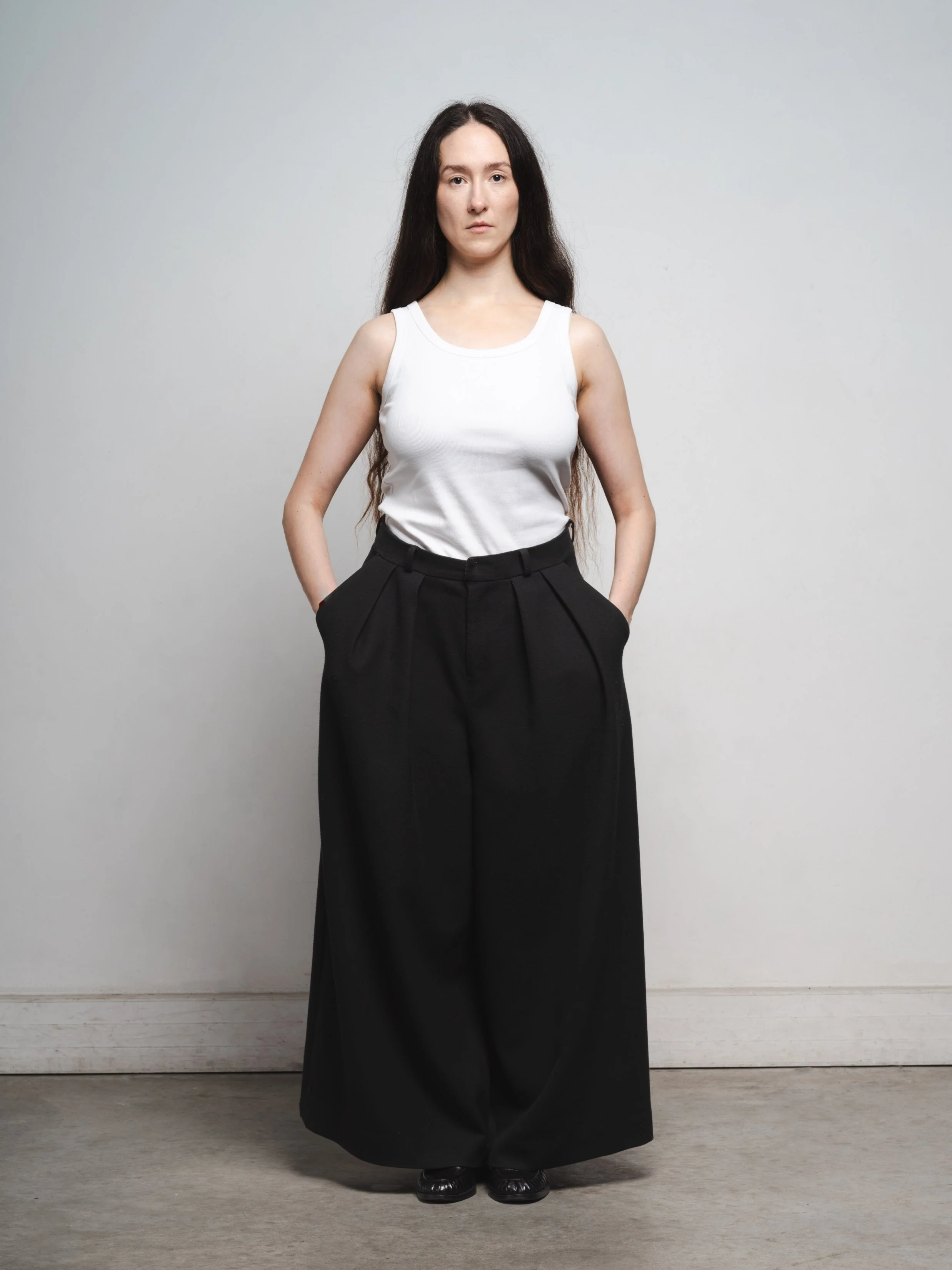 Pantalon noir à plis