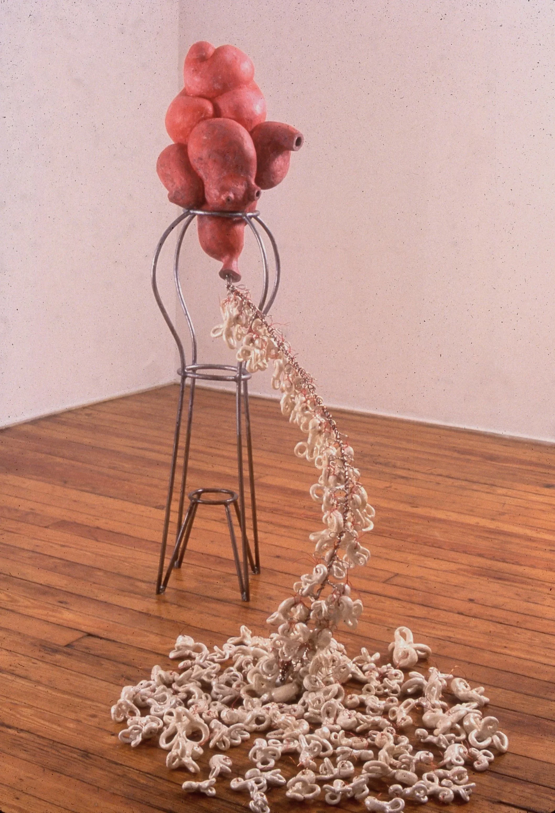 Aural Obsession 1993 55 x 48 x 30 inches clay, steel, and wire