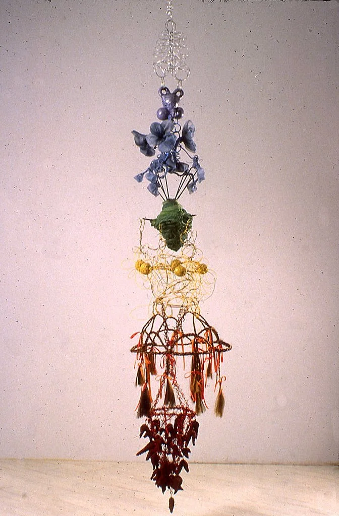 Sakti's Charms 1995 7 ft x 3 ft diameter ceramic, wire, fabric, plaster, synthetic hair, mixed media