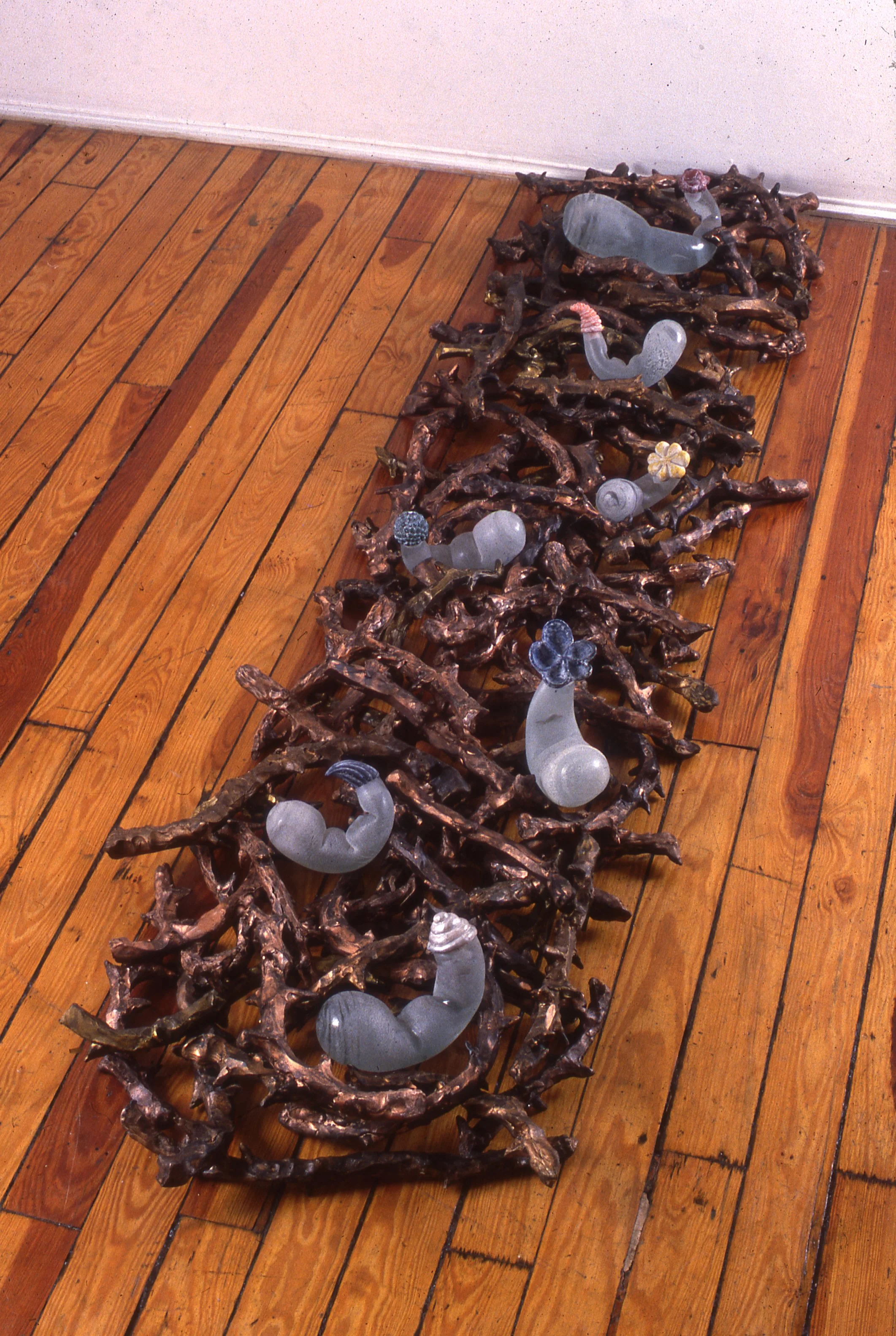 Parthenogenesis 1993 10 x 80 x 24 inches ceramic, glass, sculpey, and pigments