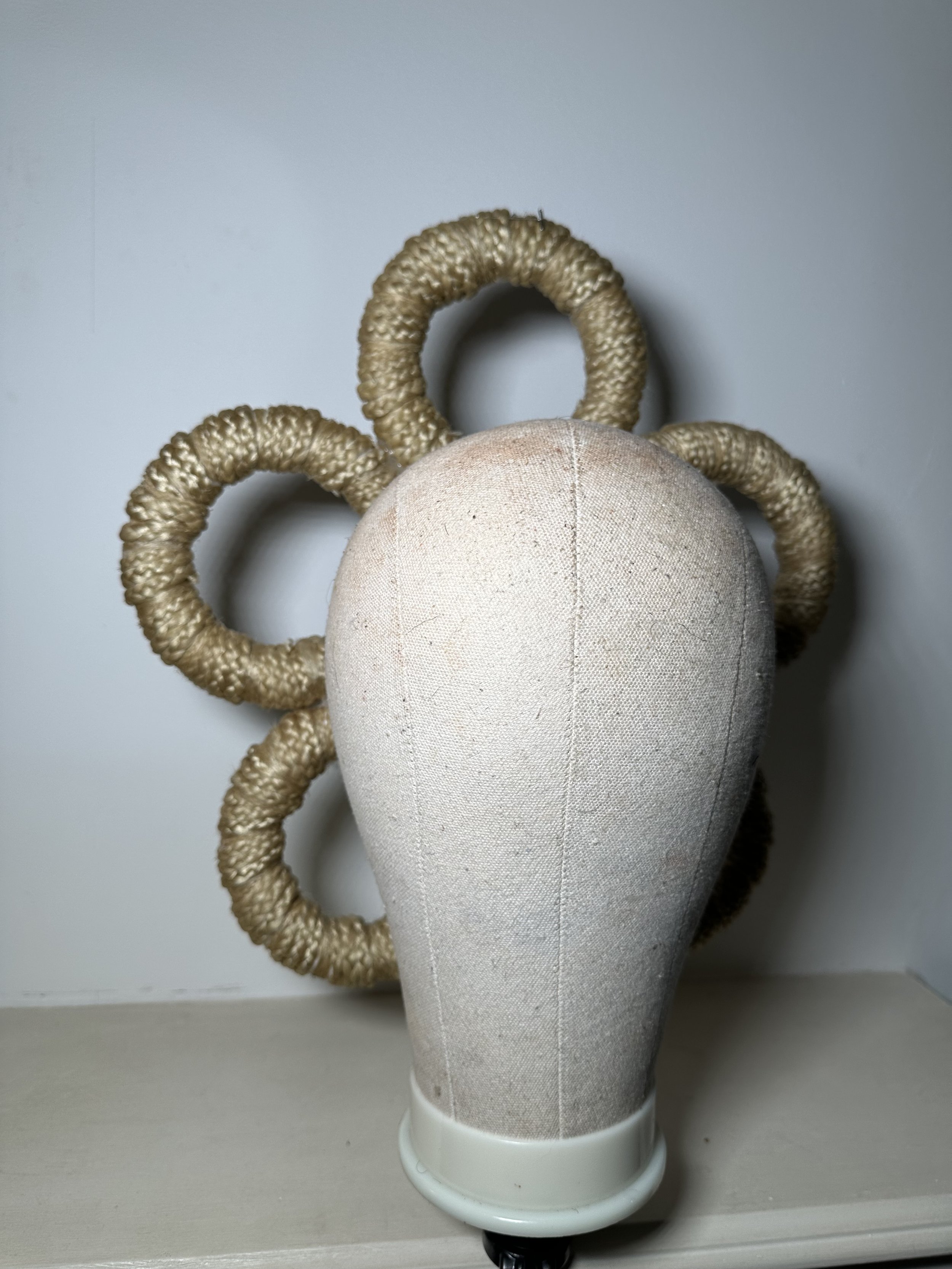 Modern house with outdoor pool, lounge chairs, trees, and desert landscaping.