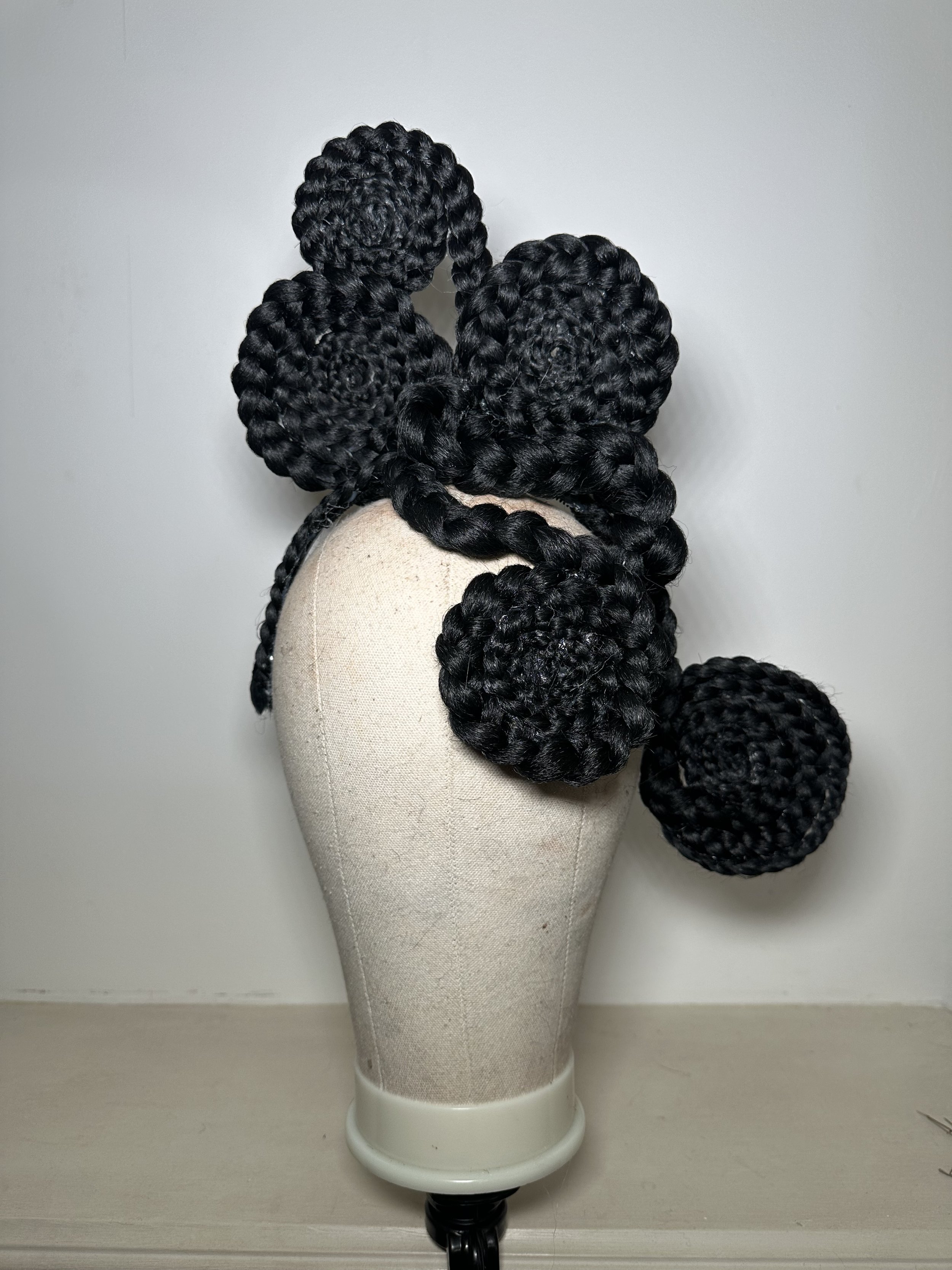 Wild daisies blooming in a field during sunset with warm, soft lighting.