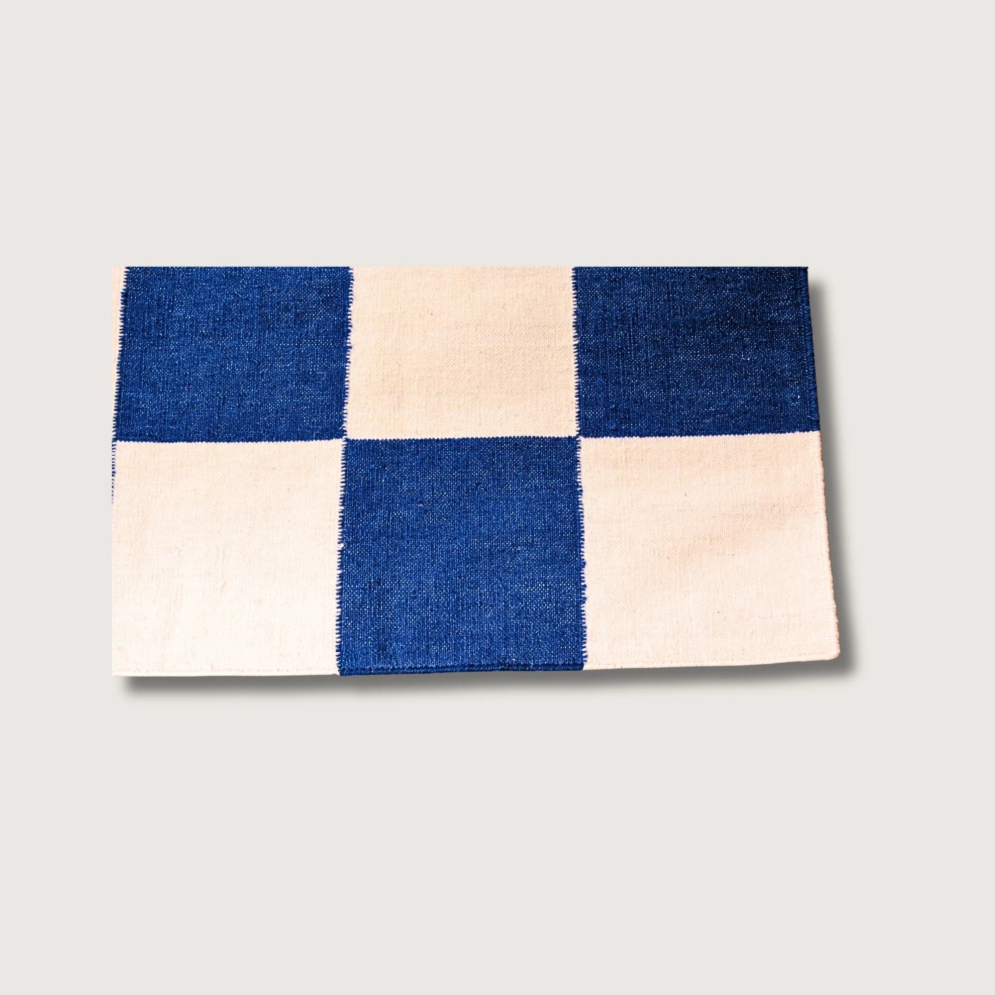 Khana Neel rug showing checkered pattern, texture and color contrast