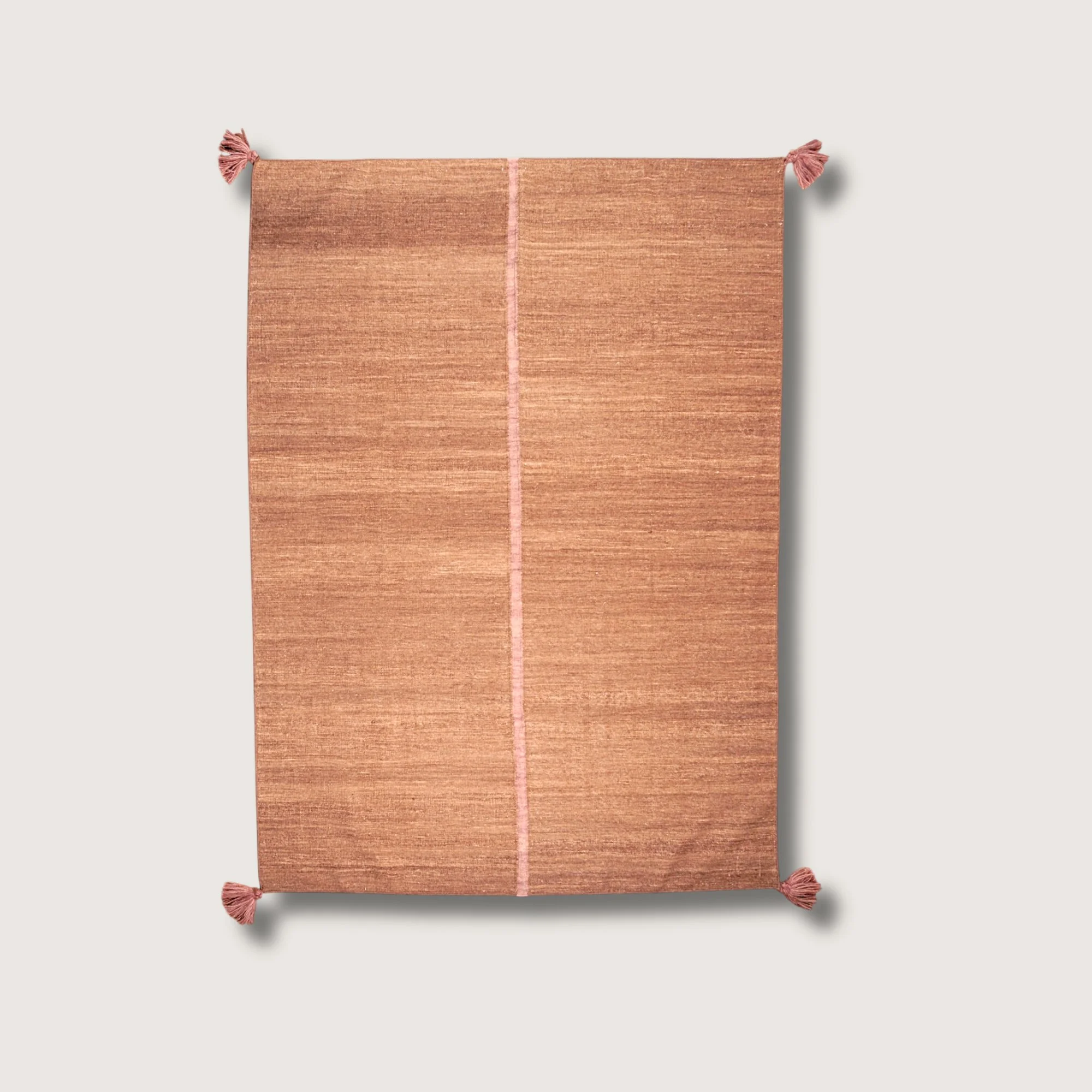 Lakir Gulab handwoven wool rug with earthy tones and a single pink vertical line, minimal flatweave design
