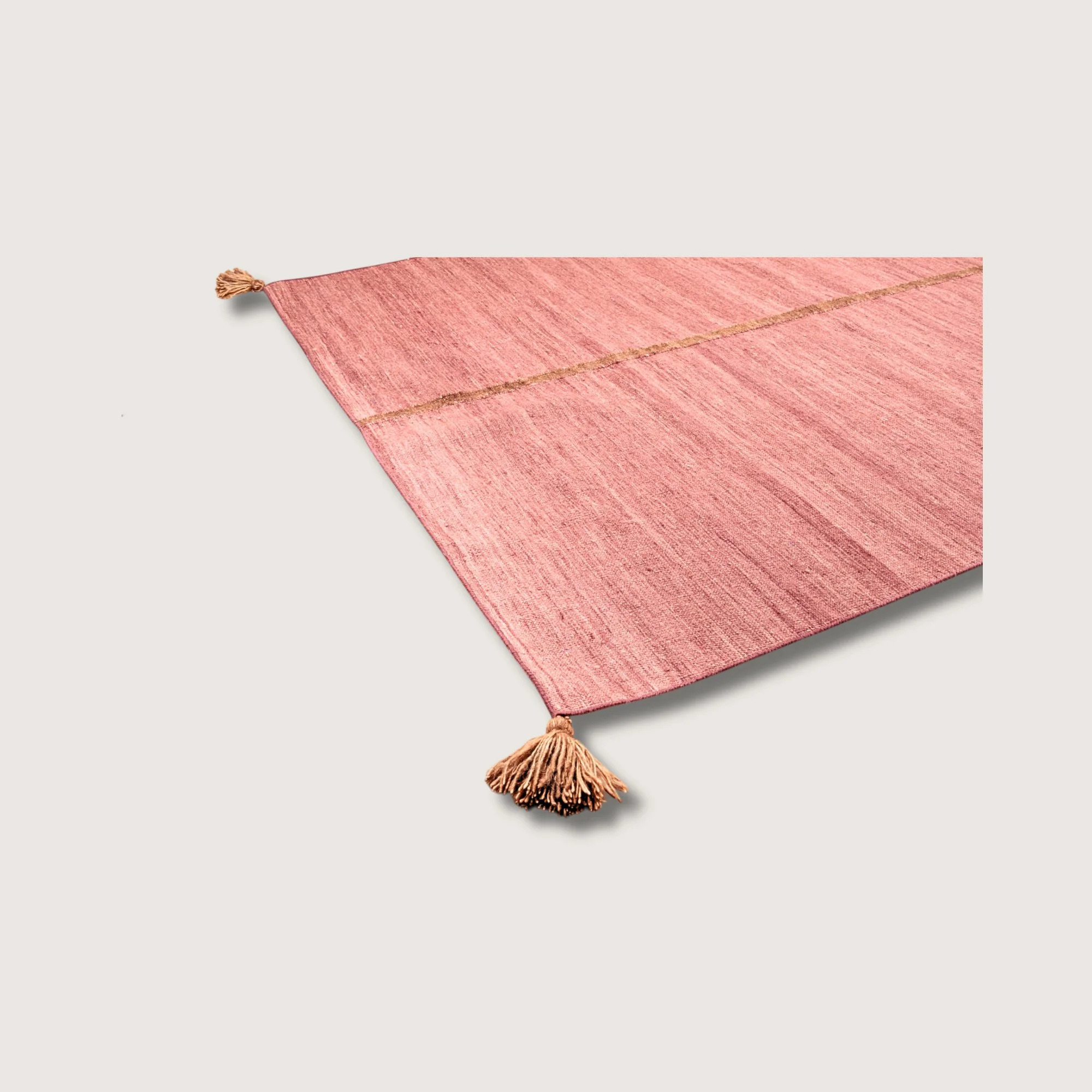 Angled view of Lakir Mitti rug with brown line detail and natural wool texture