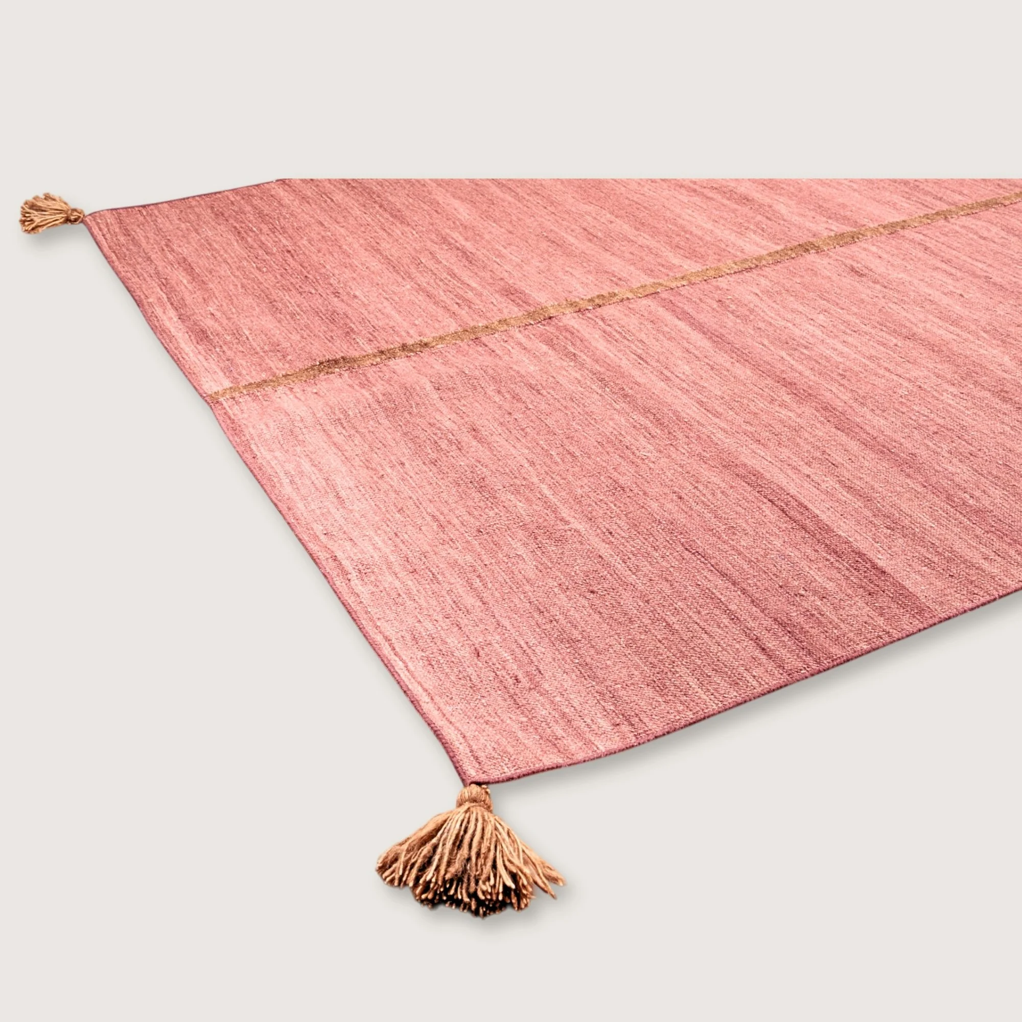 Lakir Mitti handwoven wool rug with soft rose tones and a single brown vertical line, minimal flatweave design