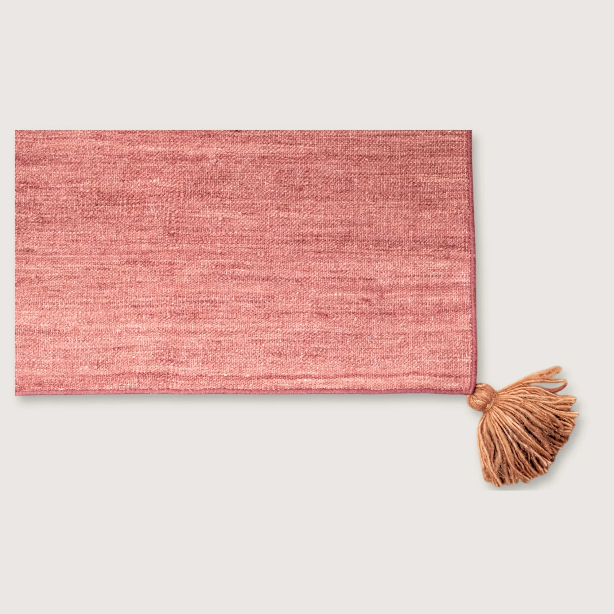 Lakir Mitti handwoven wool rug with soft rose tones and a single brown vertical line, minimal flatweave design