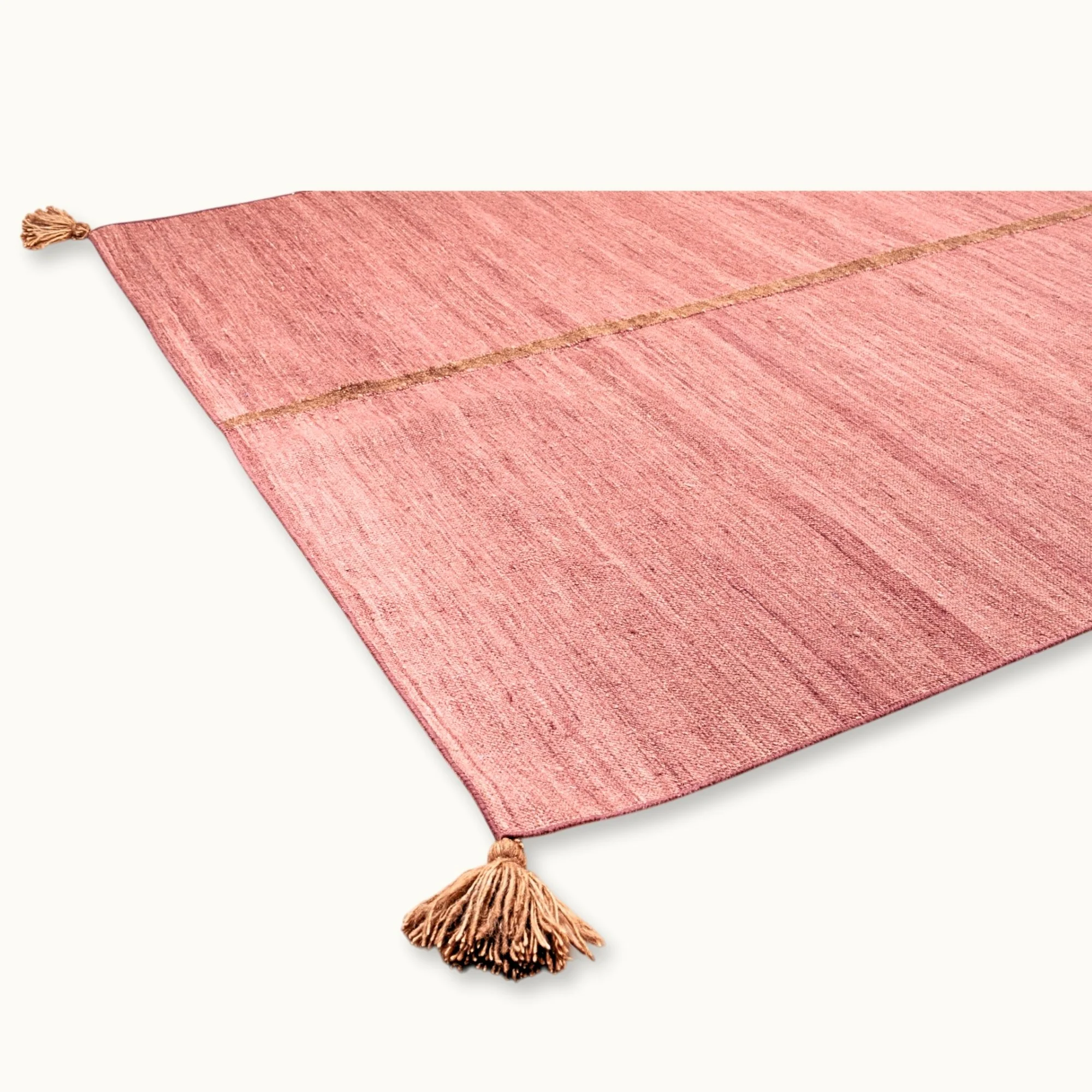 Lakir Mitti handwoven wool rug with soft rose tones and a single brown vertical line, minimal flatweave design