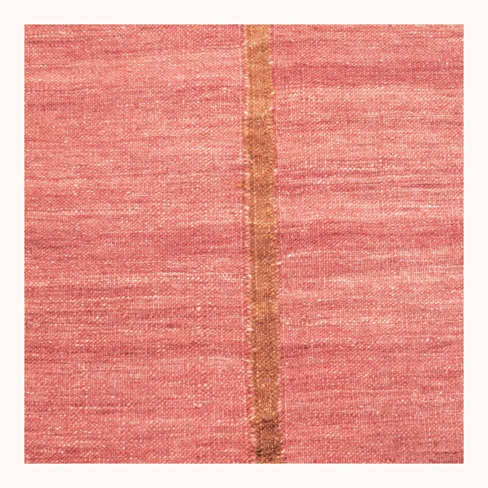 Lakir Mitti handwoven wool rug with soft rose tones and a single brown vertical line, minimal flatweave design