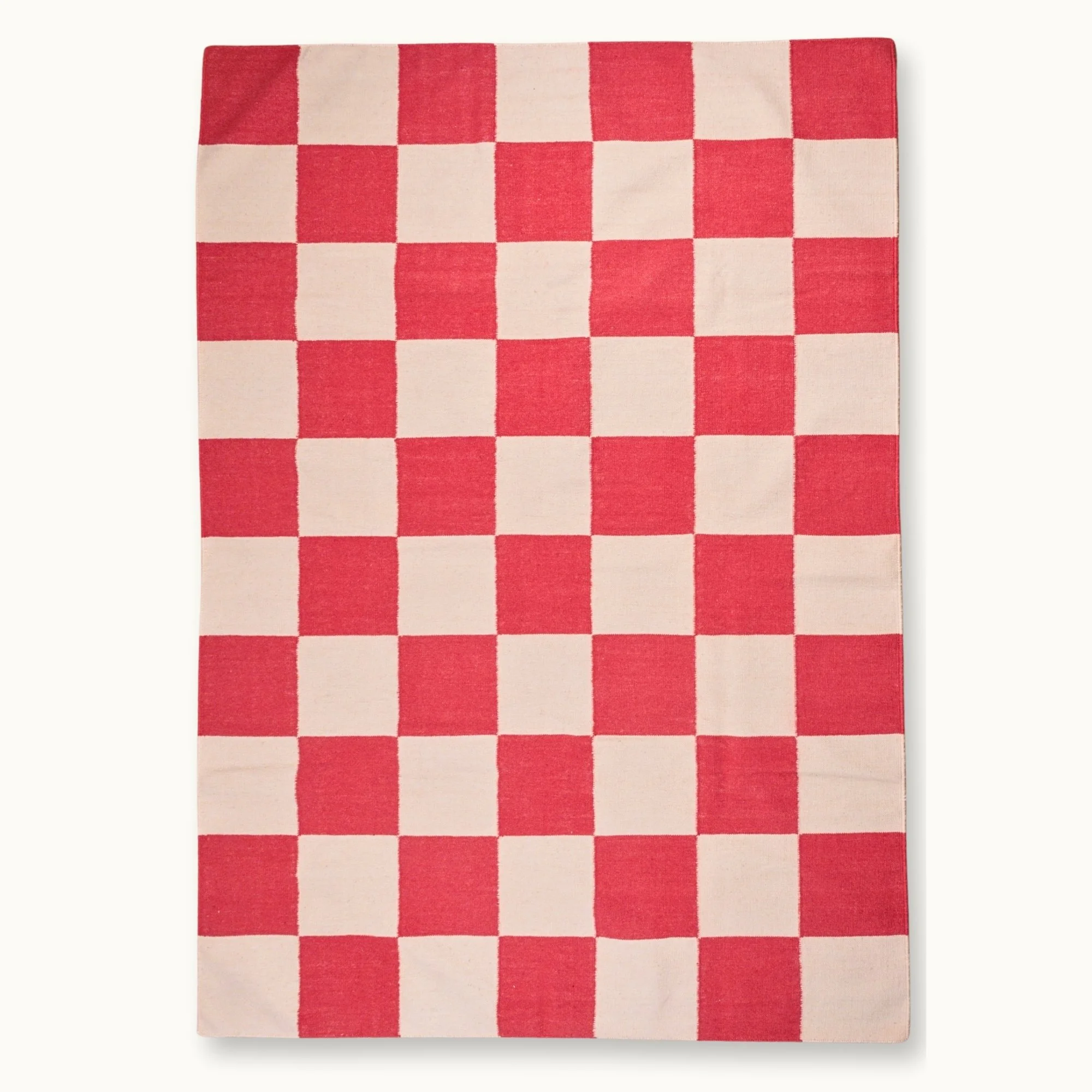 Handwoven wool flatweave rug with checkerboard pattern in red and natural tones