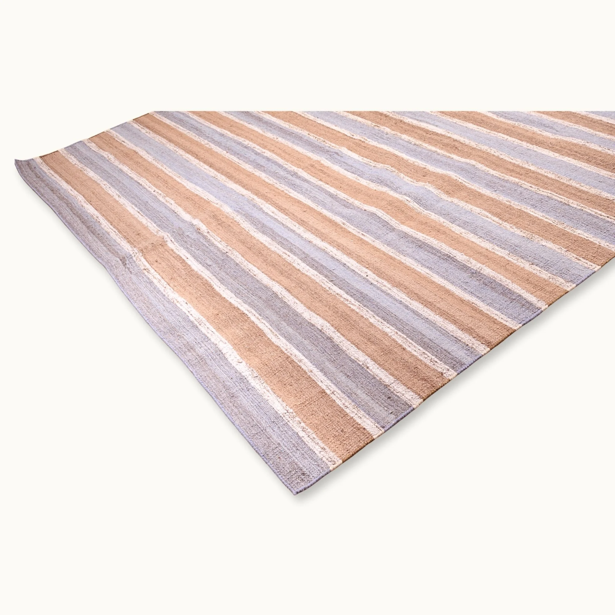 Dhaariya Neel handwoven striped wool rug with blue and natural tones, minimal flatweave design