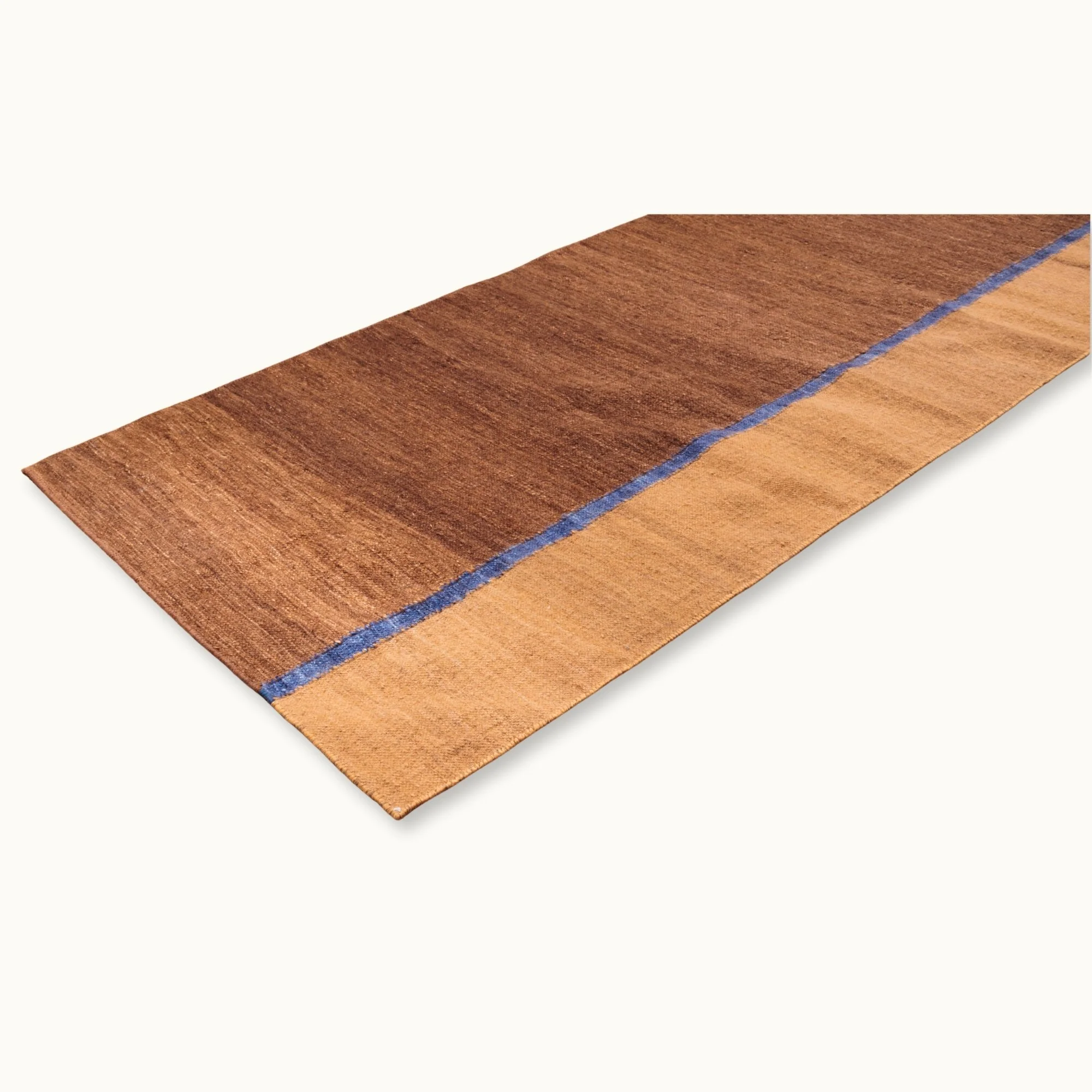 Rekha Ek handwoven wool runner with brown tones and a single blue vertical line, minimal flatweave design