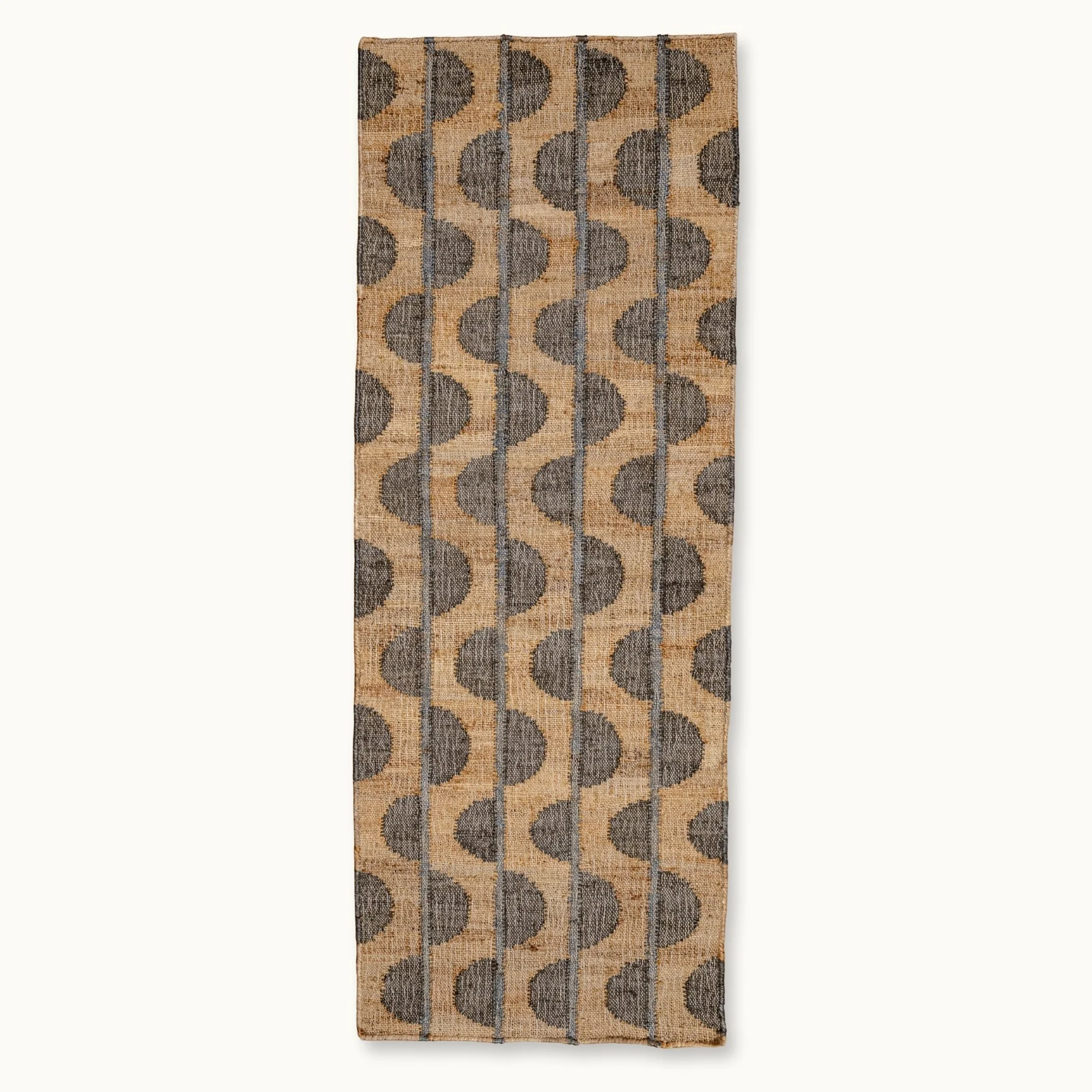 Handwoven jute rug with repeating half-moon pattern in olive green and natural sand tones.