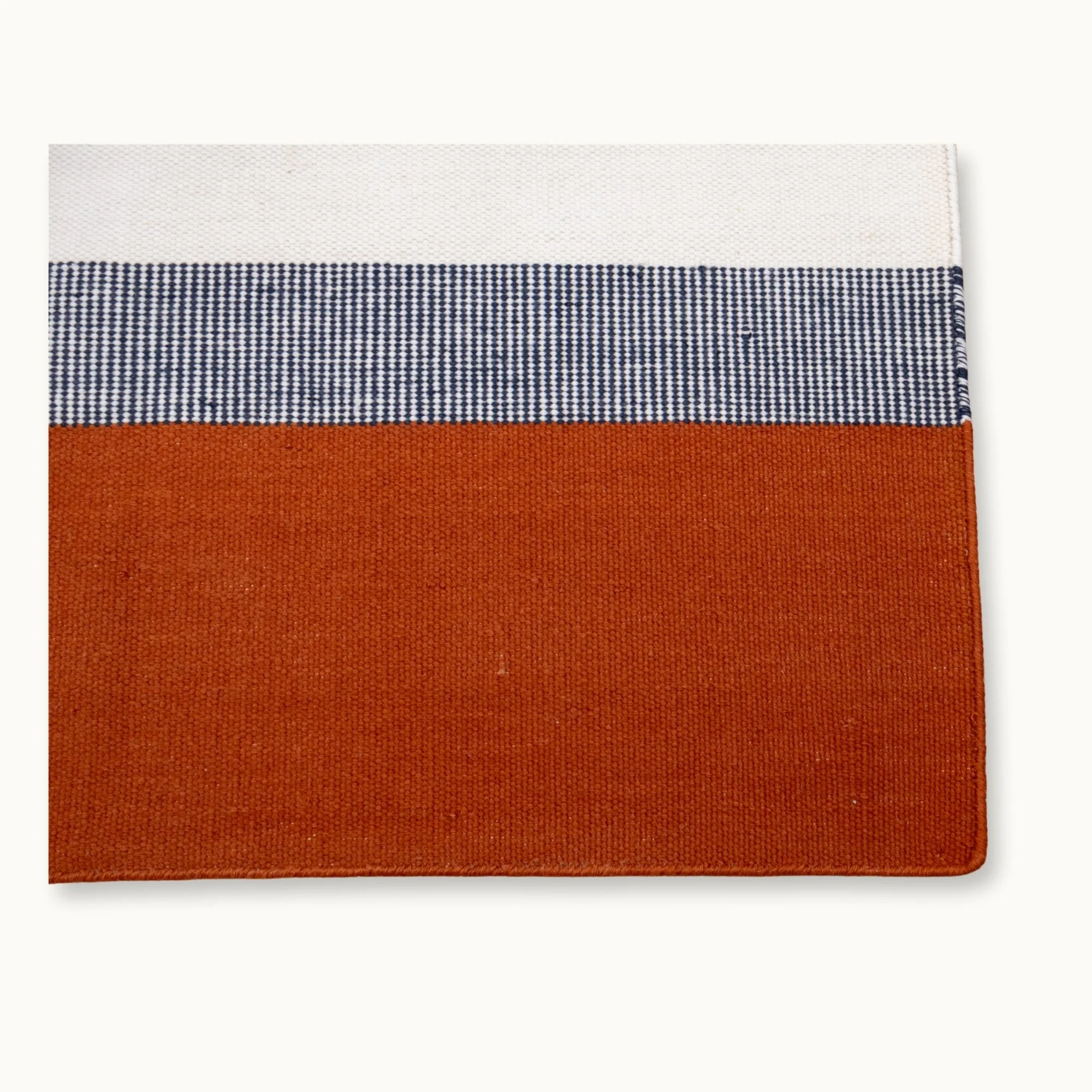 Handwoven striped runner rug in brown, blue and ivory with a modern flatweave design.