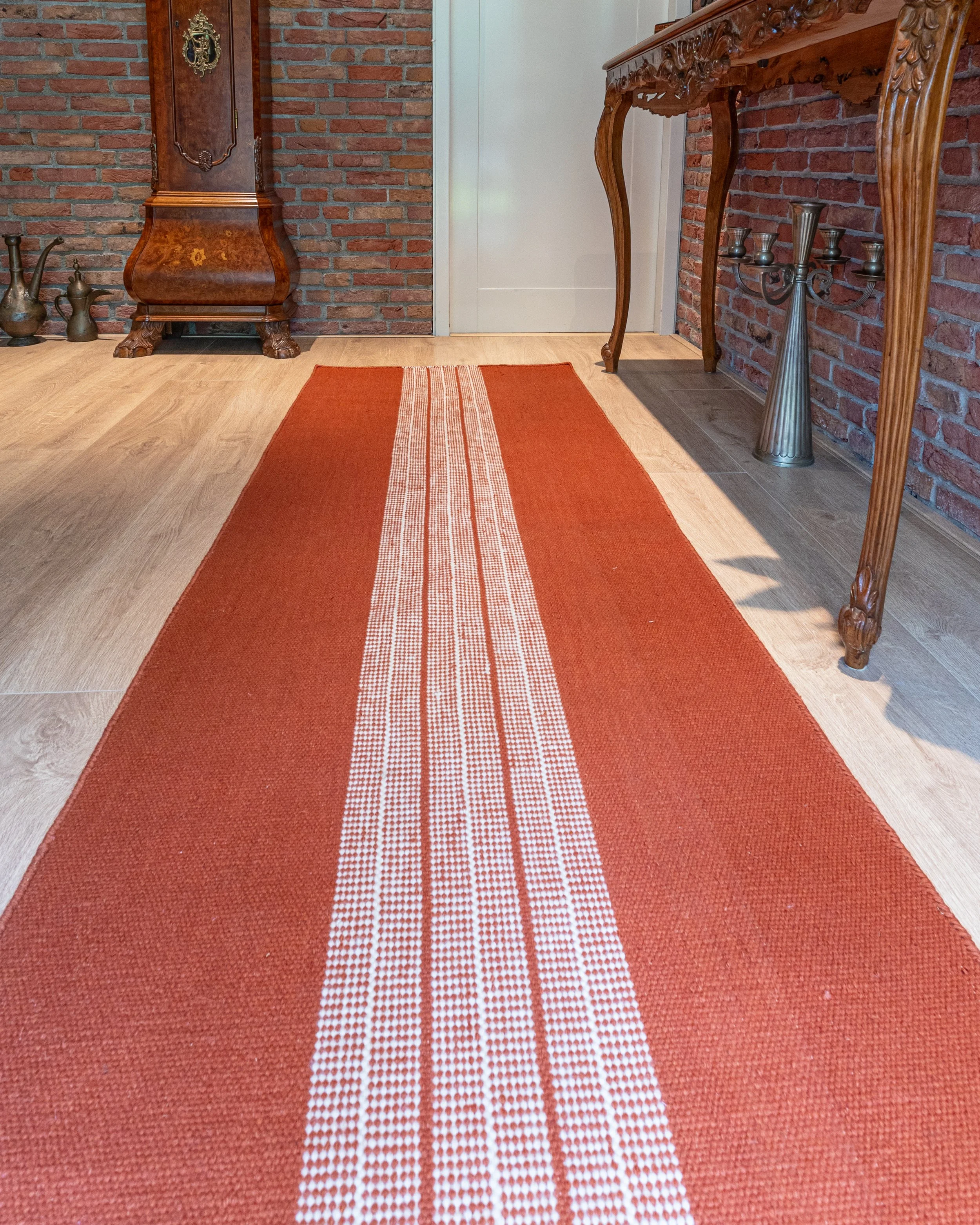Handwoven wool runner in a dutch hallway
