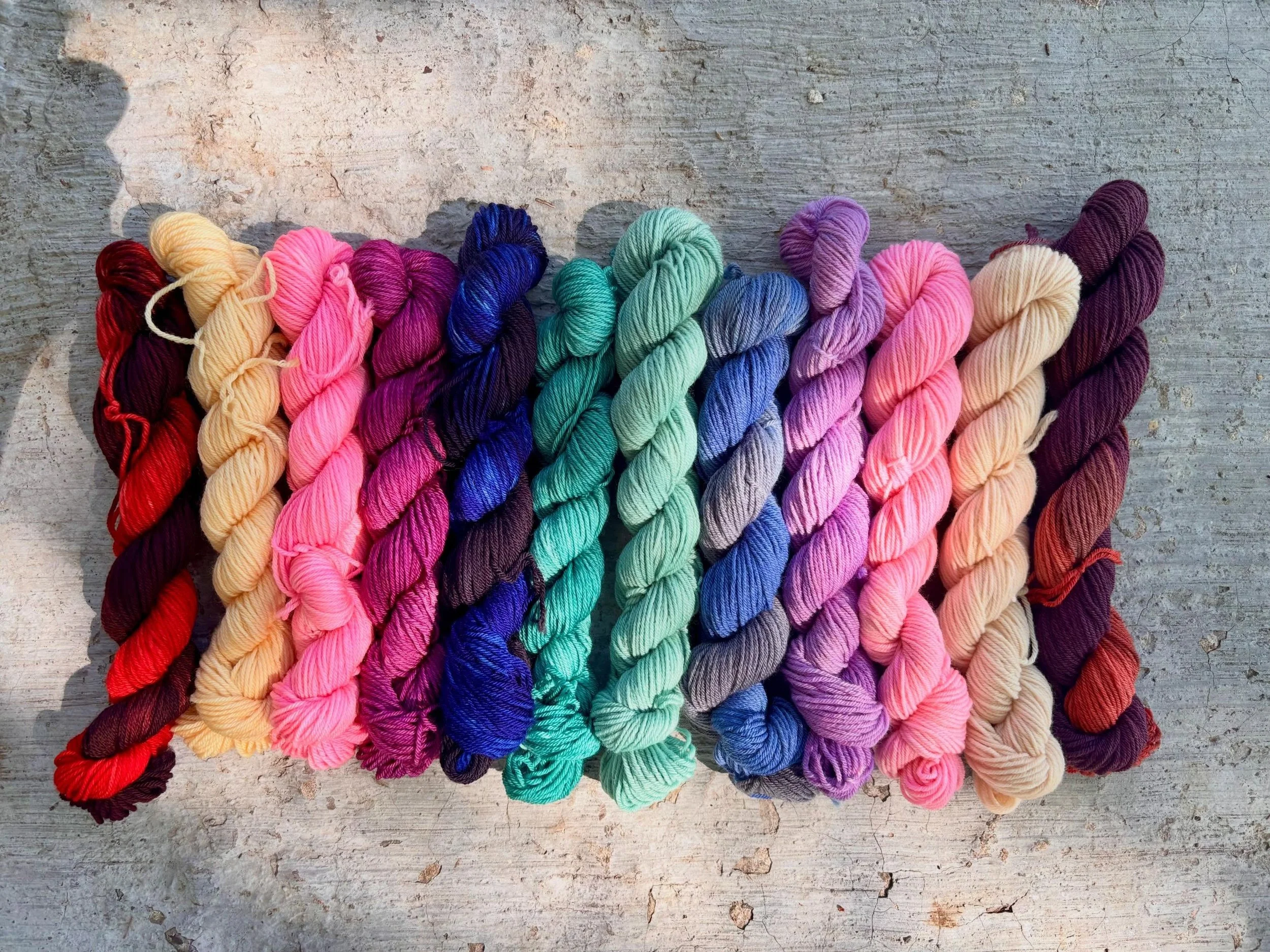 We The People is officially live!

This means you can get the full set on minis, 50s, or full skeins. You can also order each color individually. 

15% will be going to the Immigrant Defense Network. 

12 Days of Christmas Countdowns are also now ava