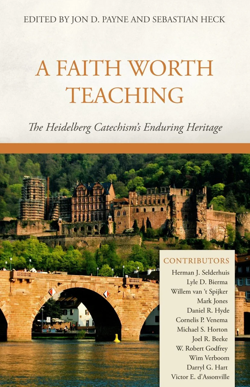 Cover of a book titled "A Faith Worth Teaching: The Heidelberg Catechism's Enduring Heritage" with editors Jon D. Payne and Sebastian Heck. The cover features a scenic view of a historic castle on a green hillside, with a stone bridge over a river in the foreground.