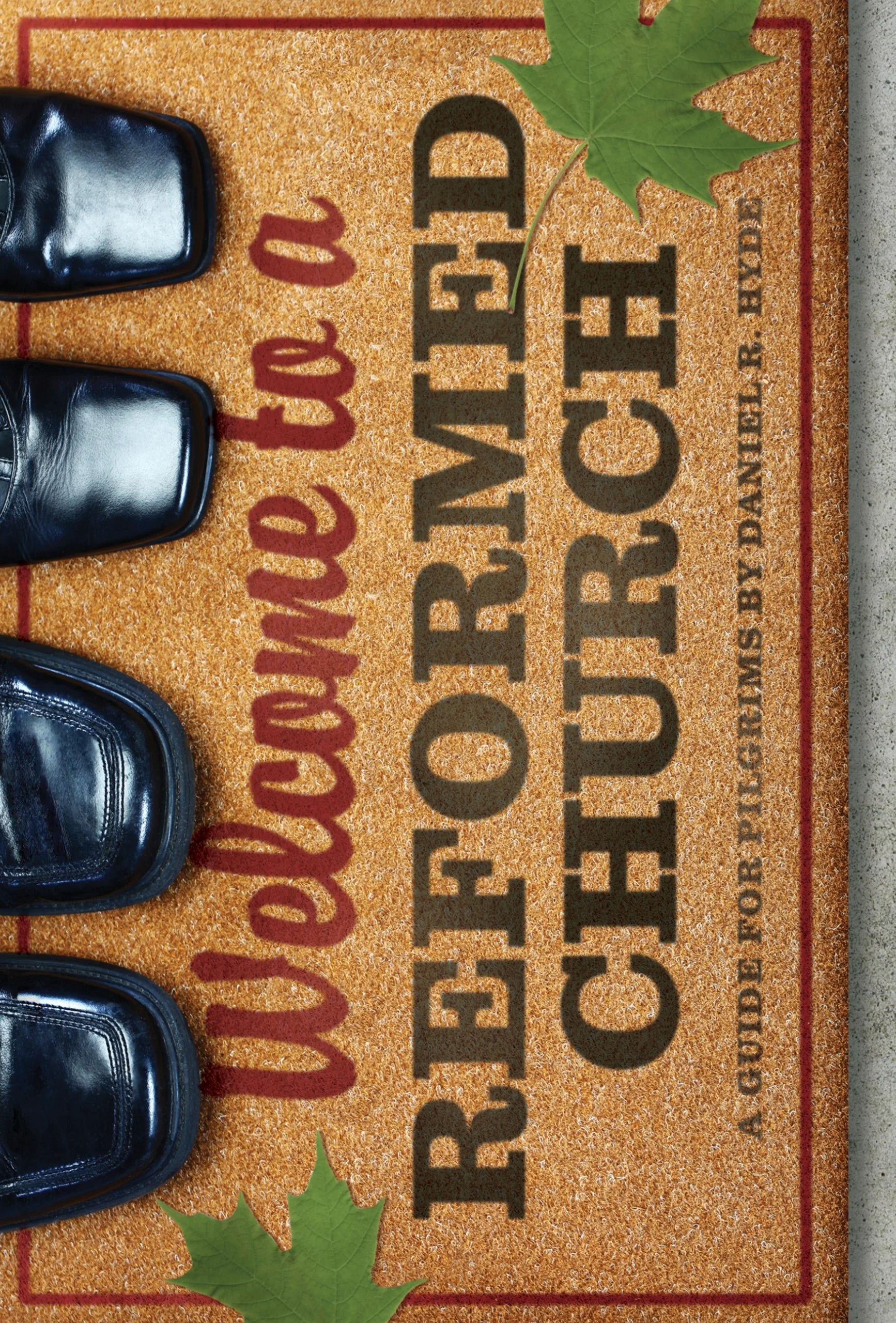 Close-up of a welcome mat with black shoes, green maple leaves, and text 'Welcome to a Reformed Church,' by Daniel R. Hyde.