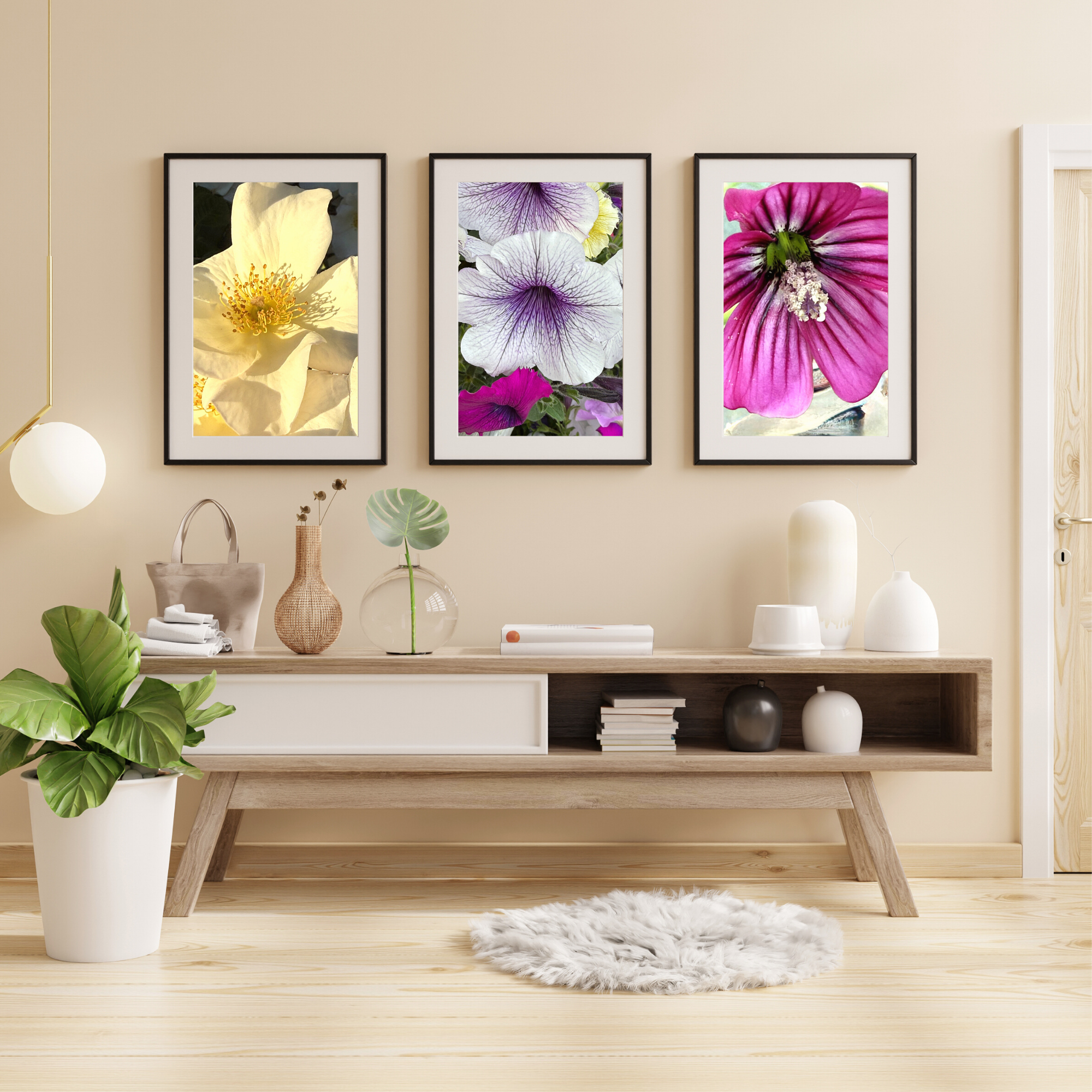 Three flowers in black frames.png
