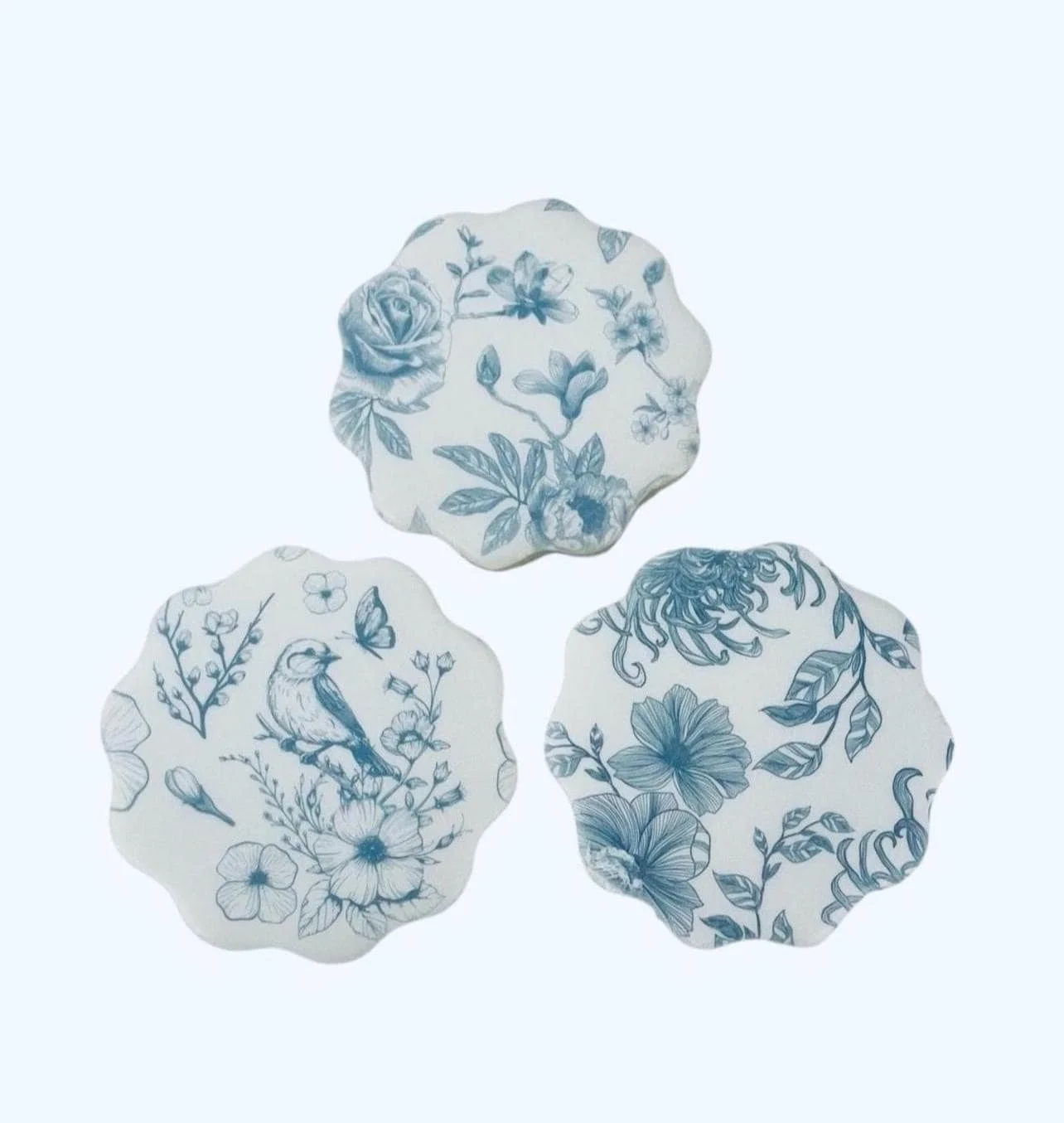 Vintage blue floral cookies set with toile botanical designs arranged together