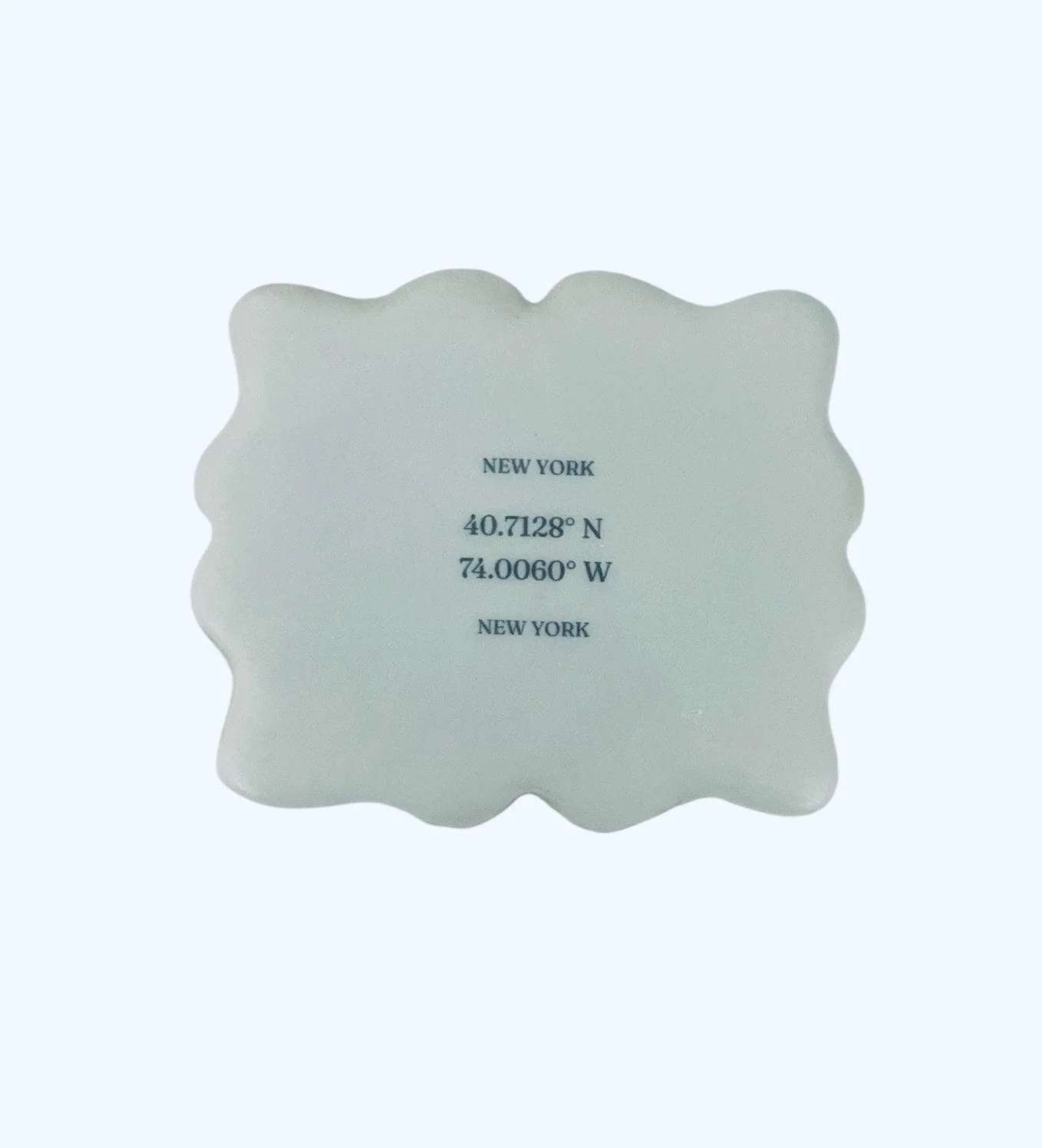 Custom coordinate cookie with printed latitude and longitude on scalloped edge sugar cookie