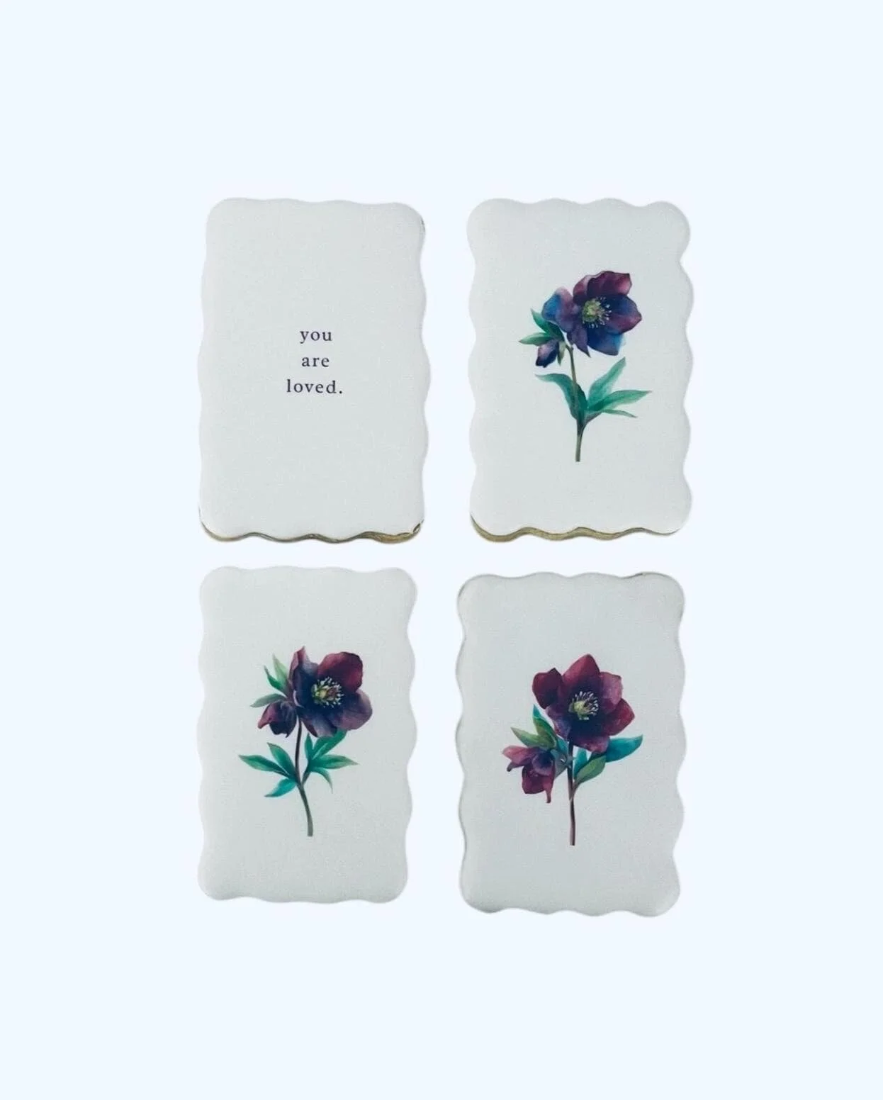 Floral you are loved cookies set arranged in a group with soft botanical designs