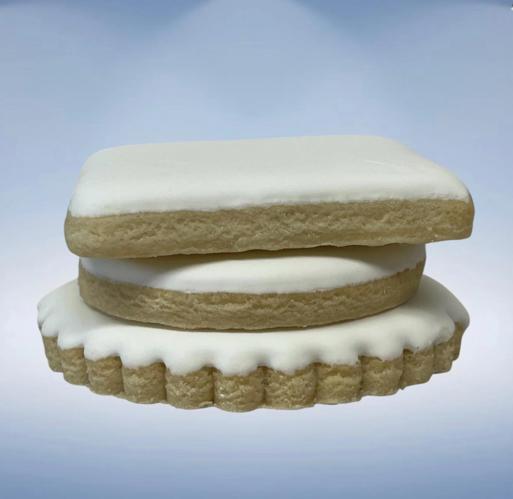 Stacked sugar cookies showing thickness and texture